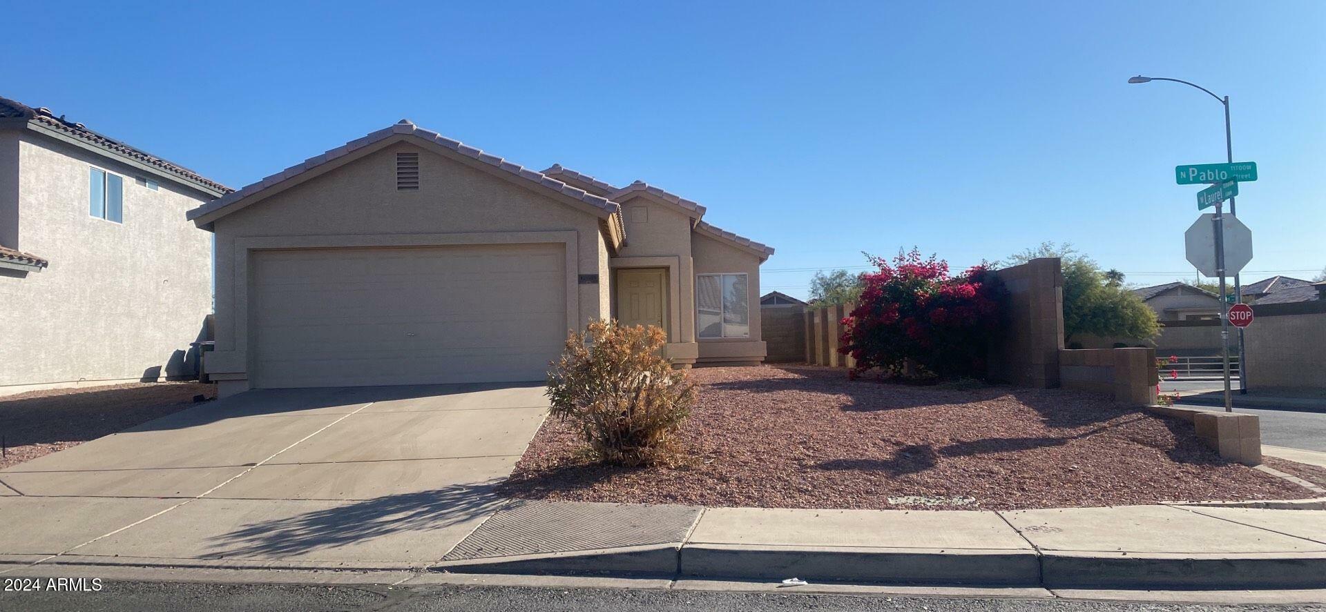 Property Photo:  12001 N Pablo Street  AZ 85335 