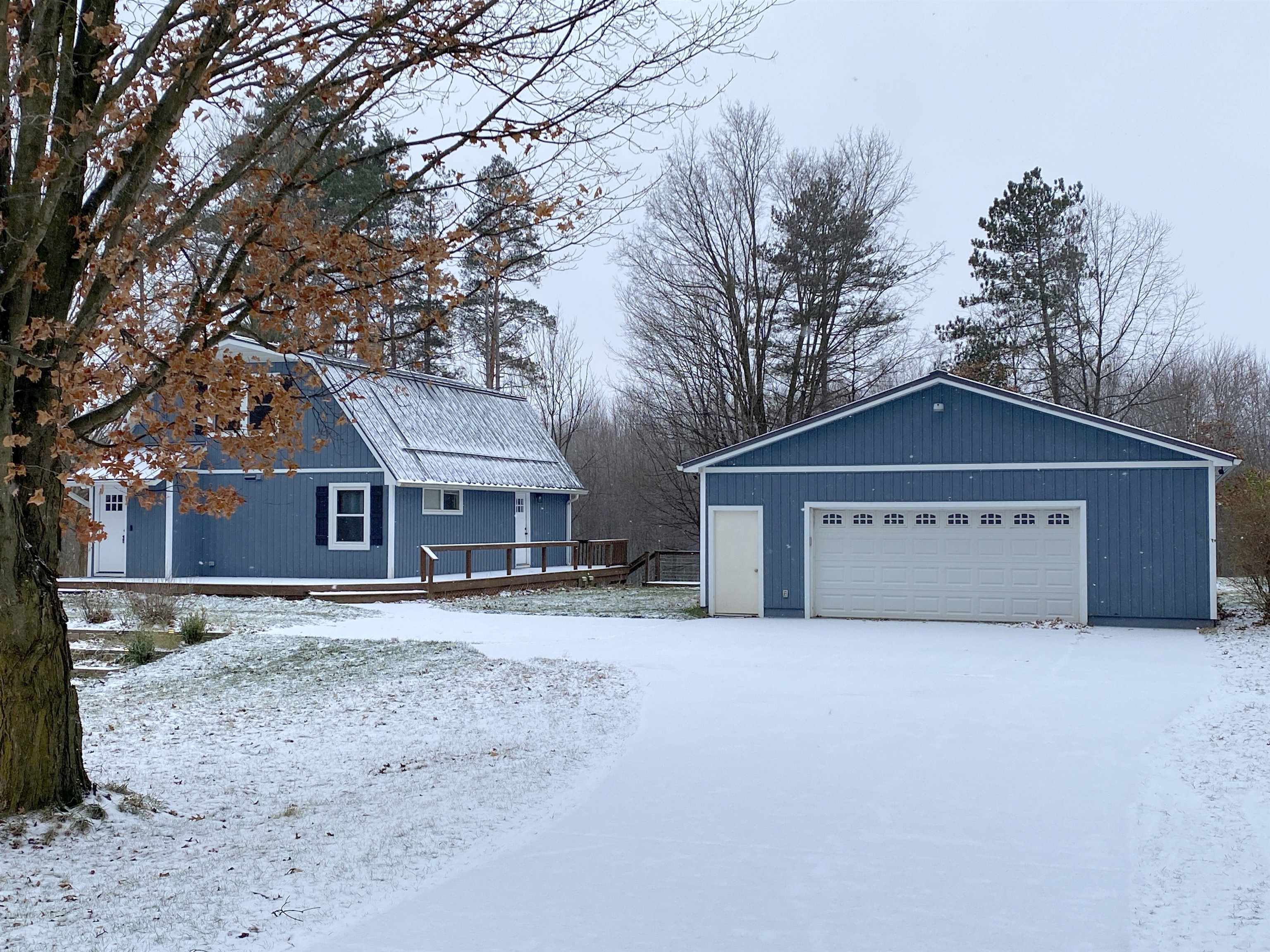 Property Photo:  8078 Hollister Road  MI 48848-9683 