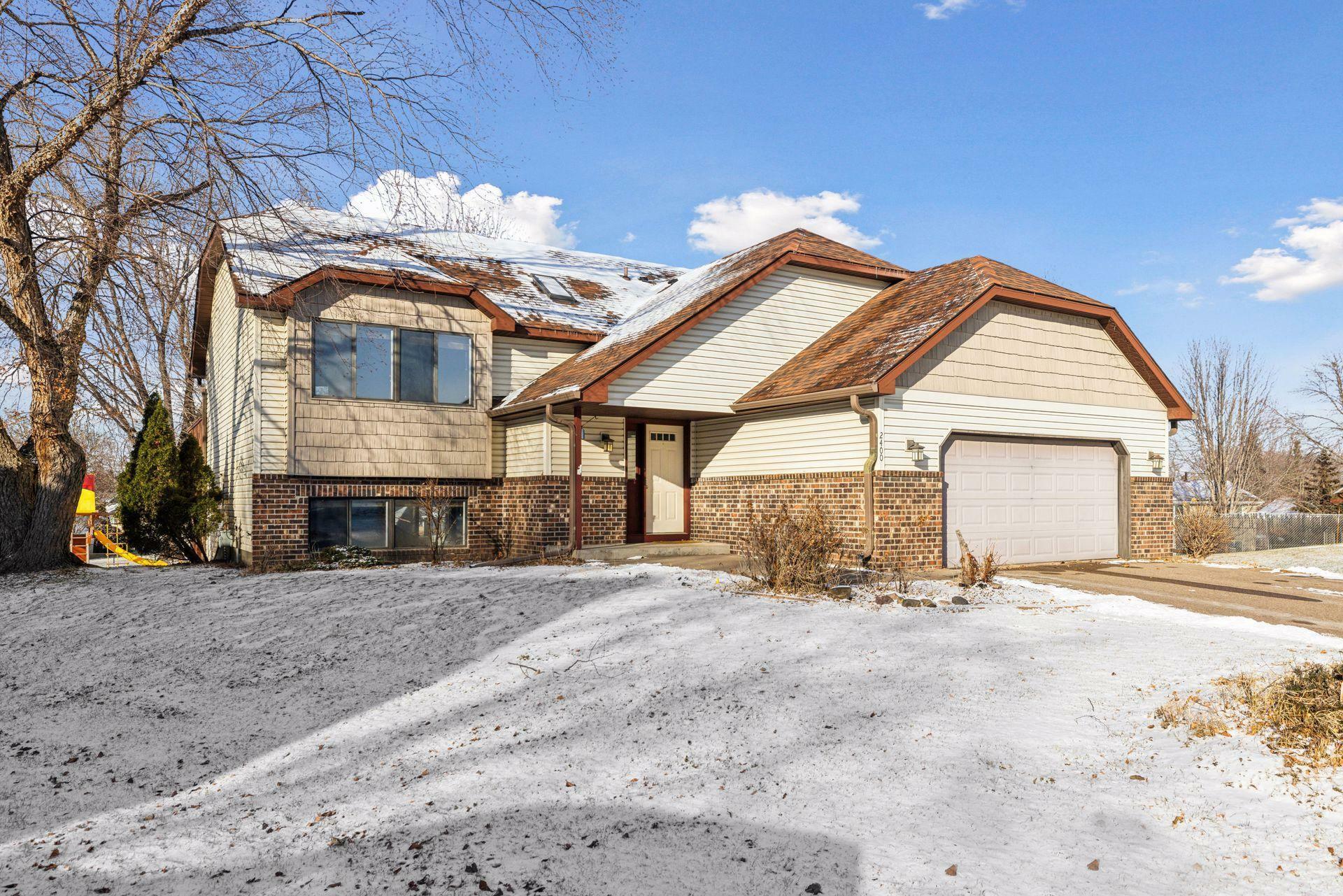 Property Photo:  2400 Helmo Avenue N  MN 55128 