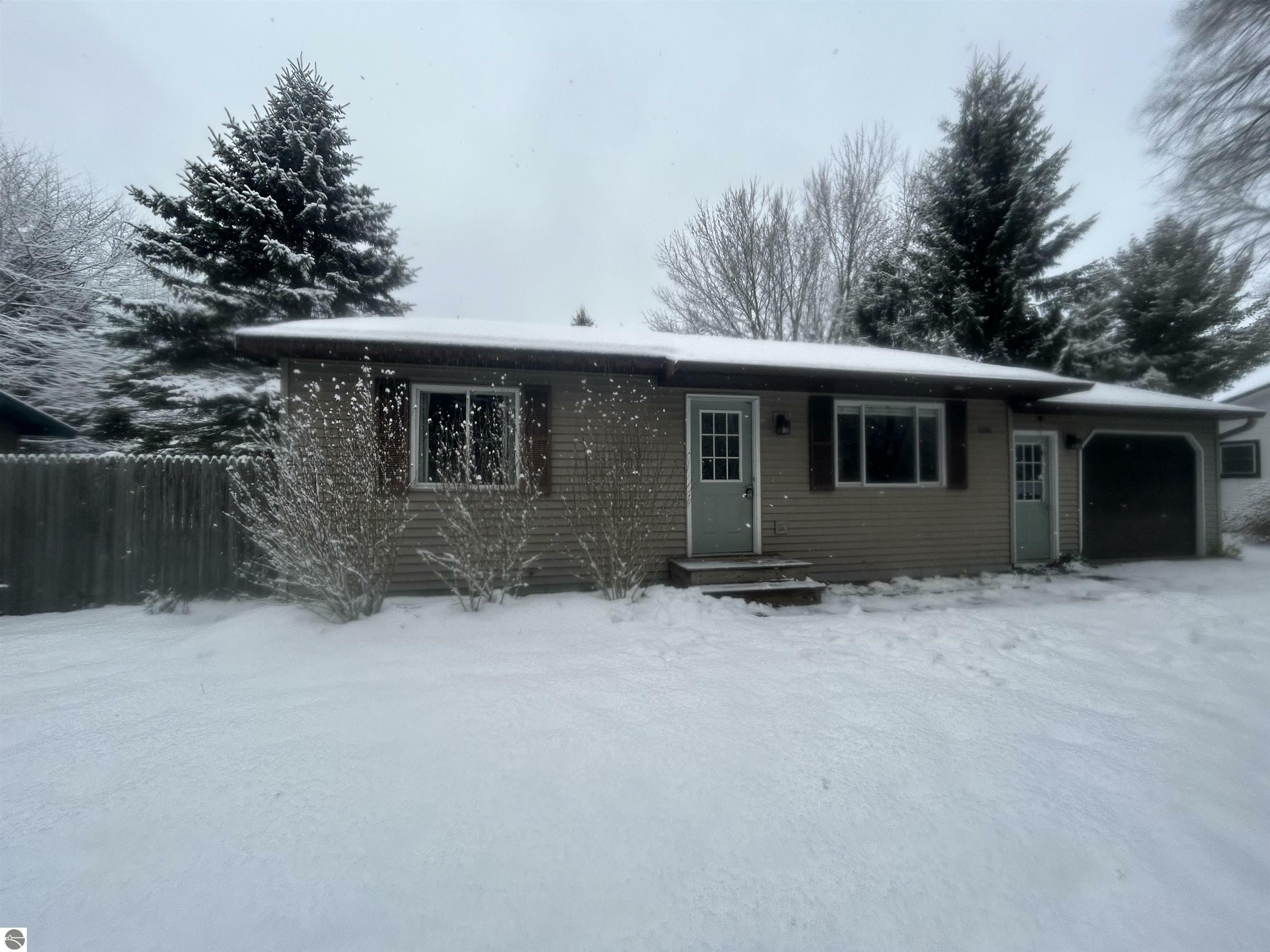 Property Photo:  6396 N Reynolds  MI 49650 