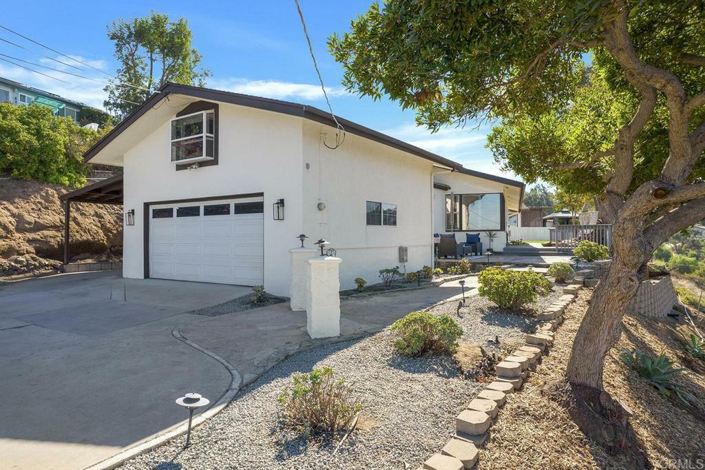 Property Photo:  12059 Los Amigos Way  CA 92040 