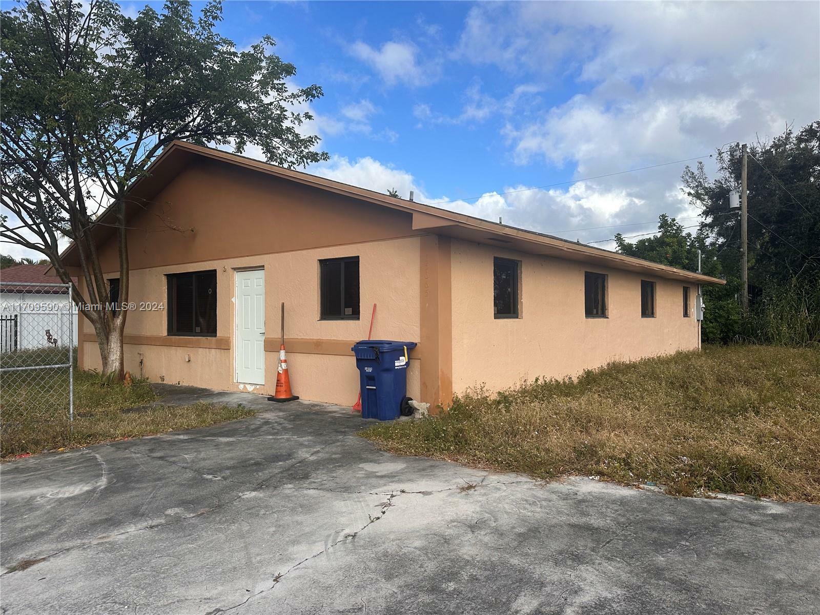 Property Photo:  15665 NW 42nd Ave  FL 33054 