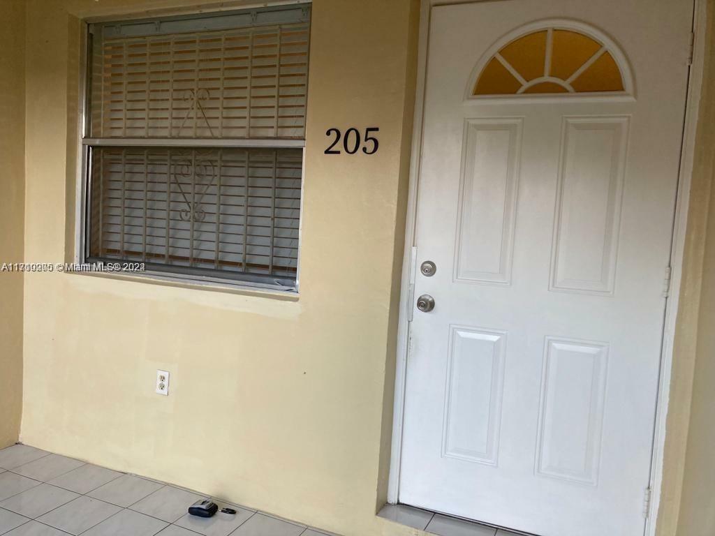 Property Photo:  421 NE 1st St 205  FL 33009 