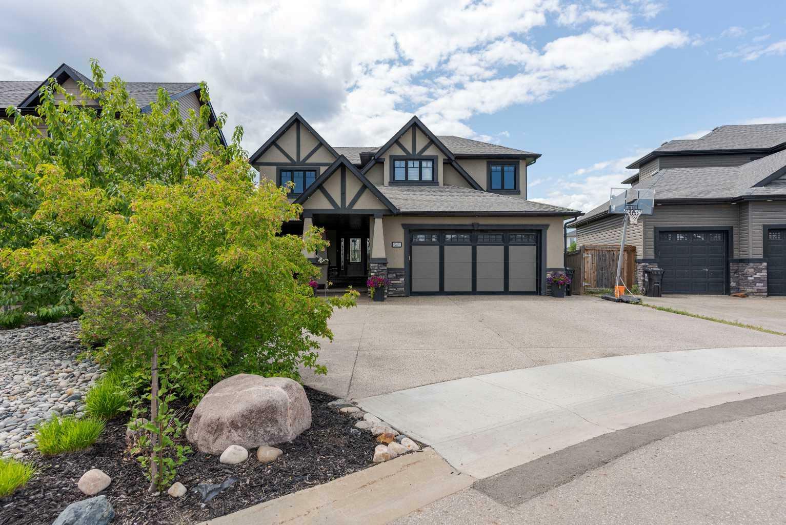 Property Photo: 243 Wild Rose Street AB T9K 0G8