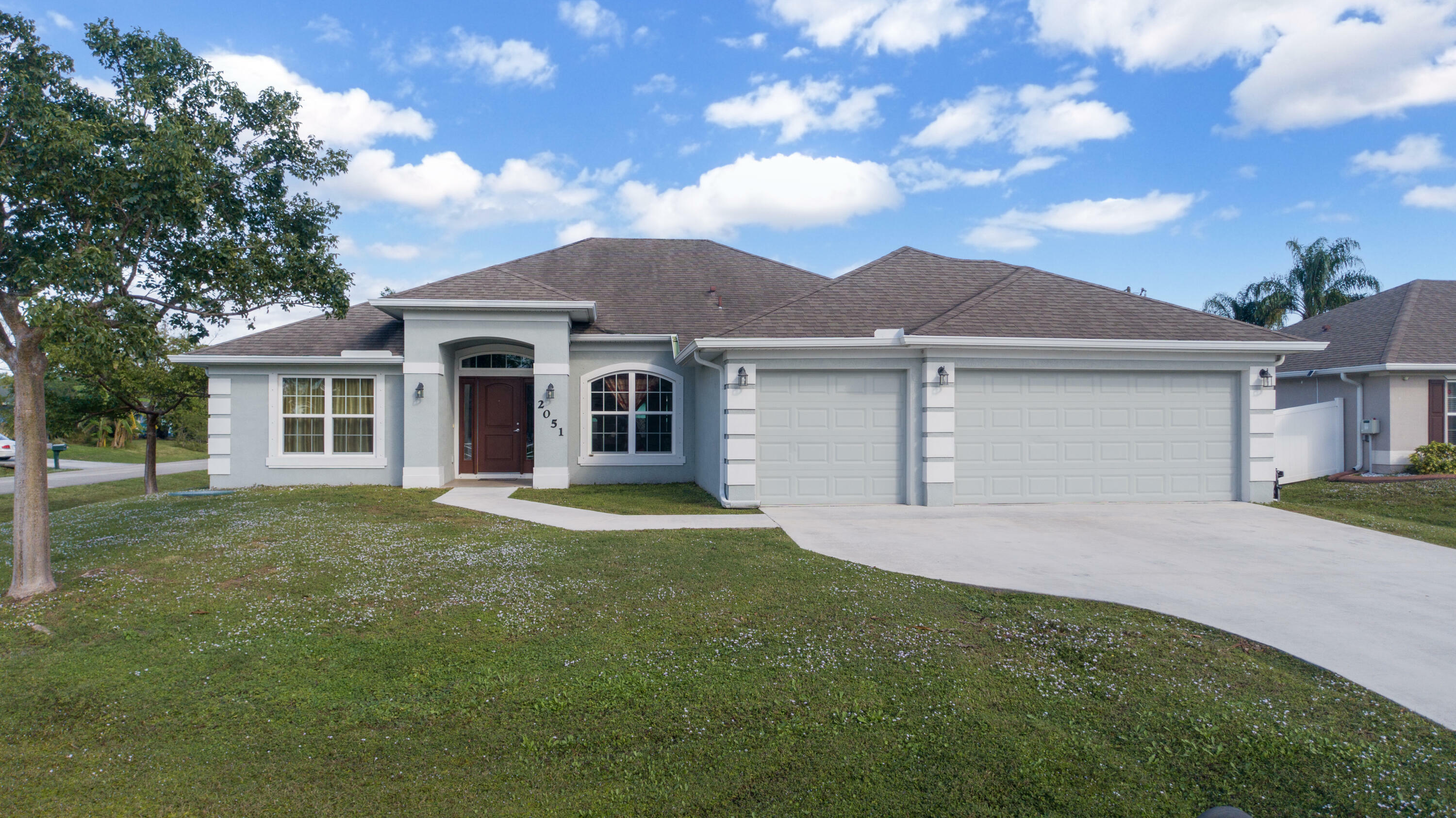 Property Photo: 2051 SW Brisbane Street FL 34984