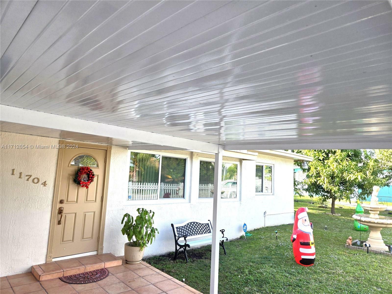 Property Photo:  11704 NW 11th Ave  FL 33168 