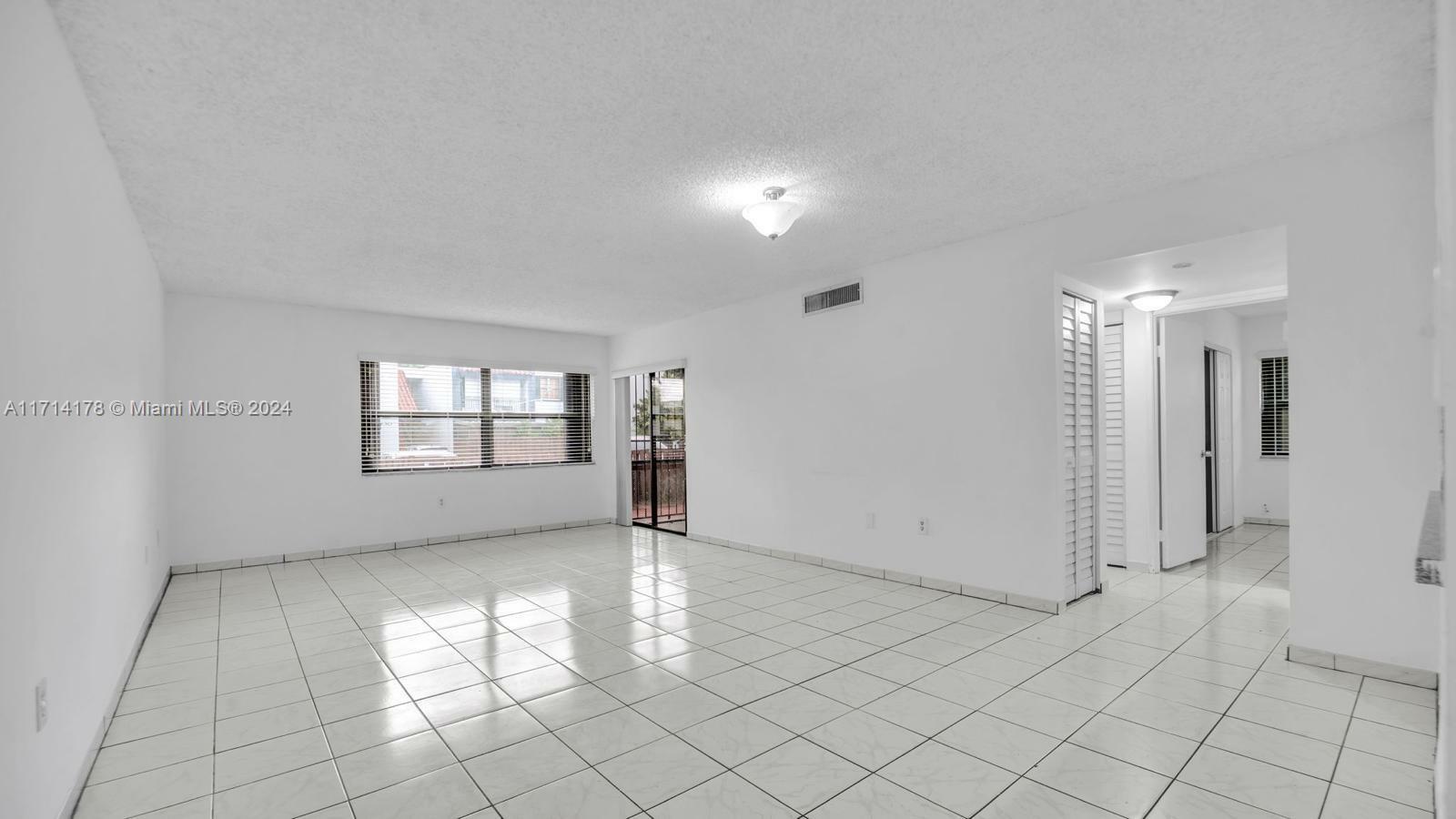 Property Photo:  440 W Park Dr 102-8  FL 33172 