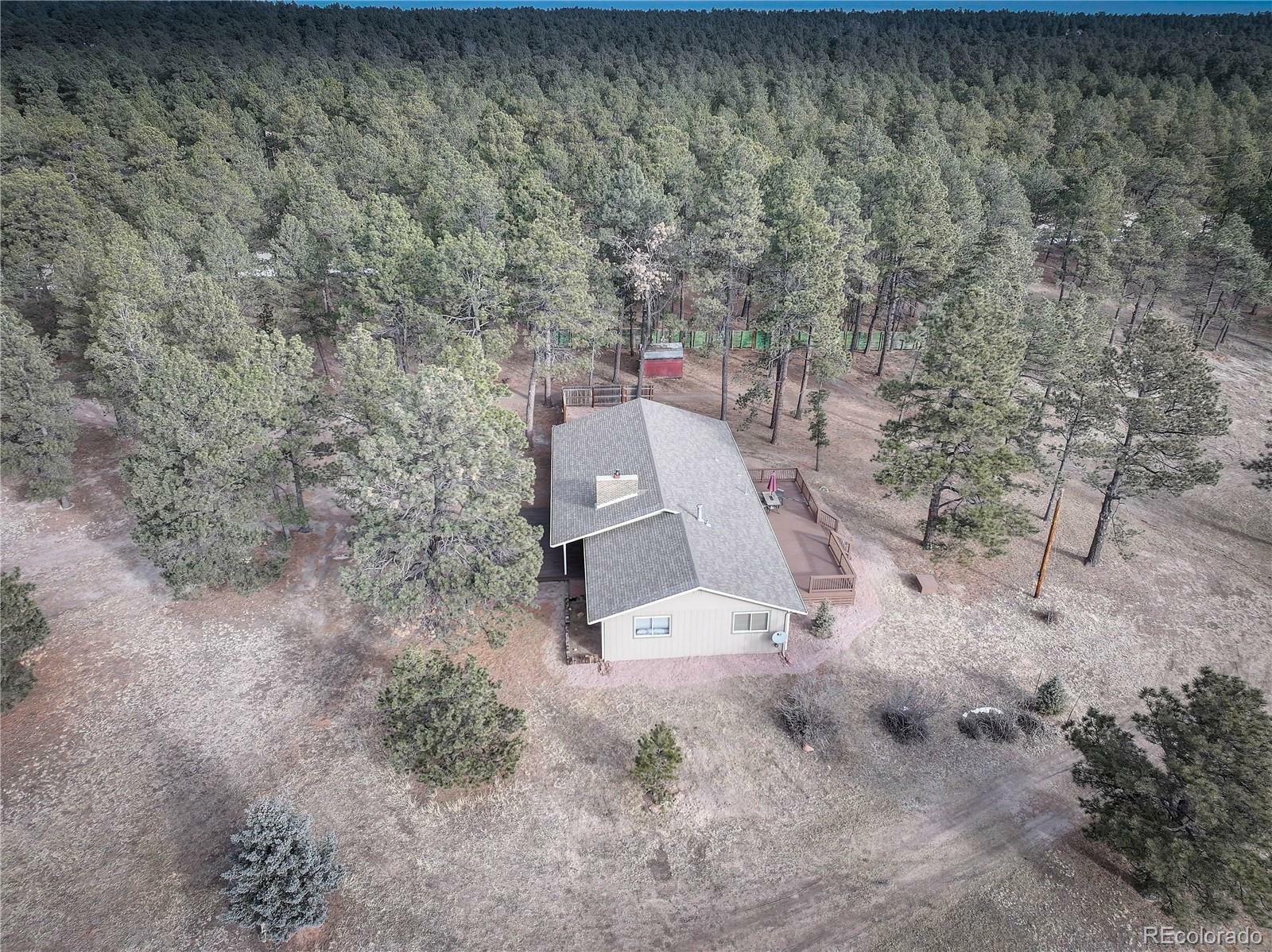 Property Photo:  9845 Pine Park Trail  CO 80908 