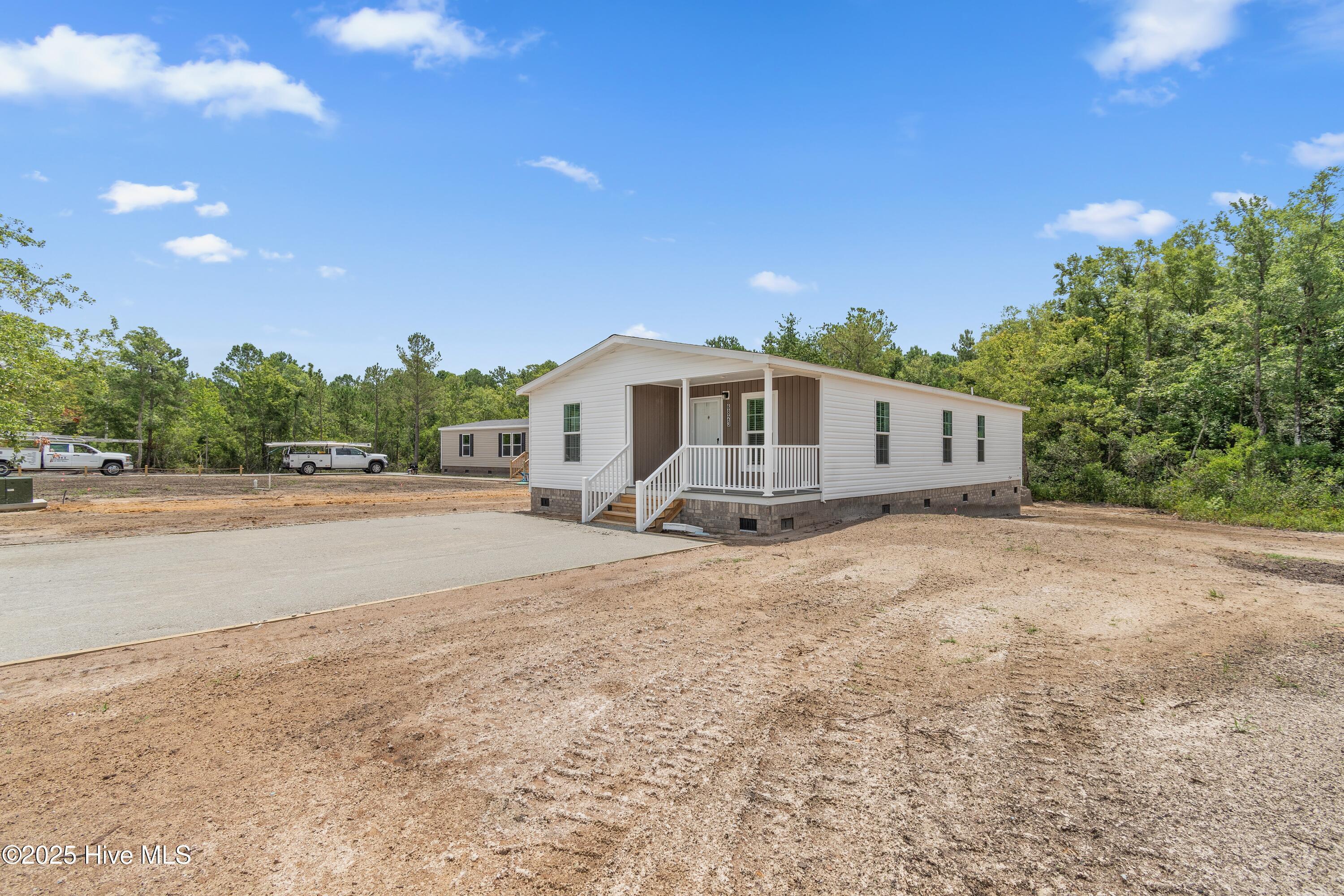 Property Photo:  6823 Lewis Drive SE  NC 28479 