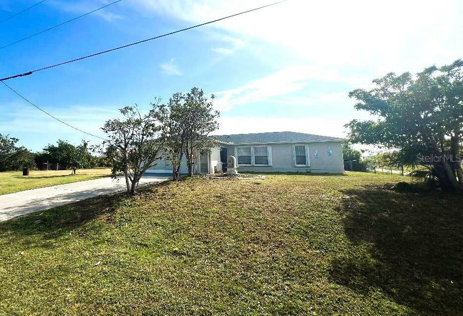 Property Photo:  12143 &Amp 12151 Dubarry Avenue  FL 33981 