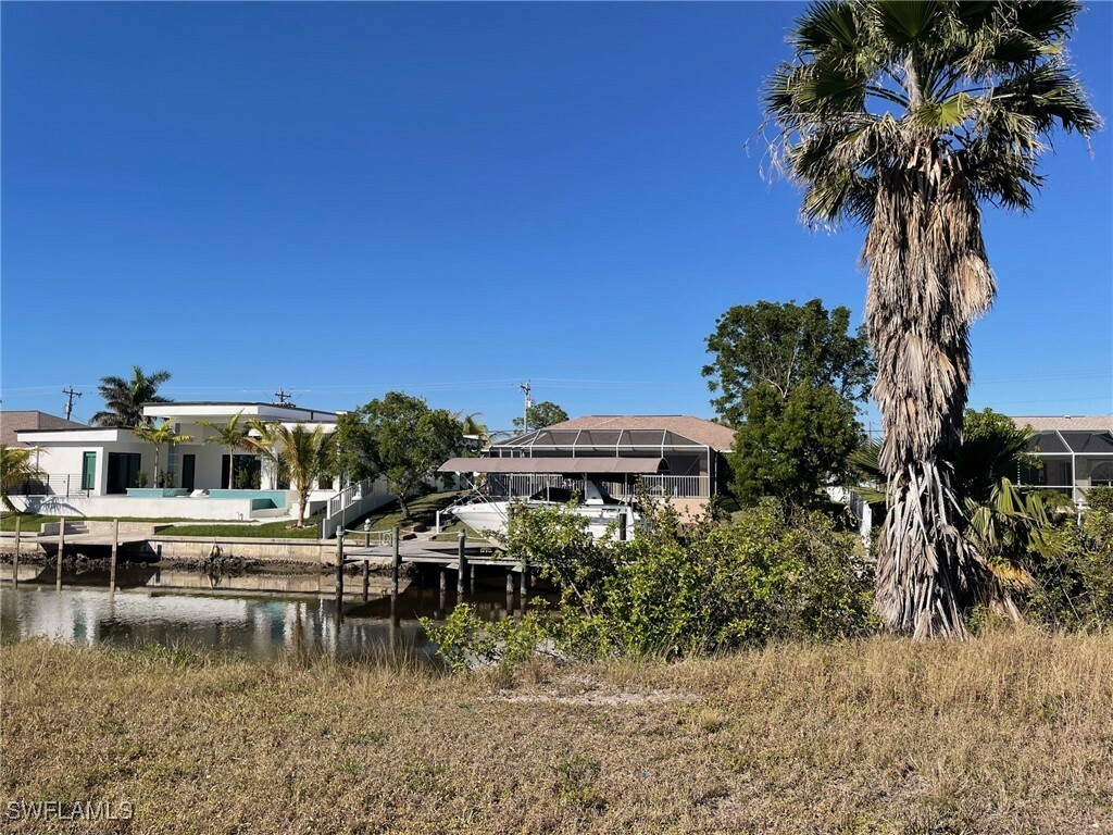 Property Photo:  909 SW 40th Terrace  FL 33914 