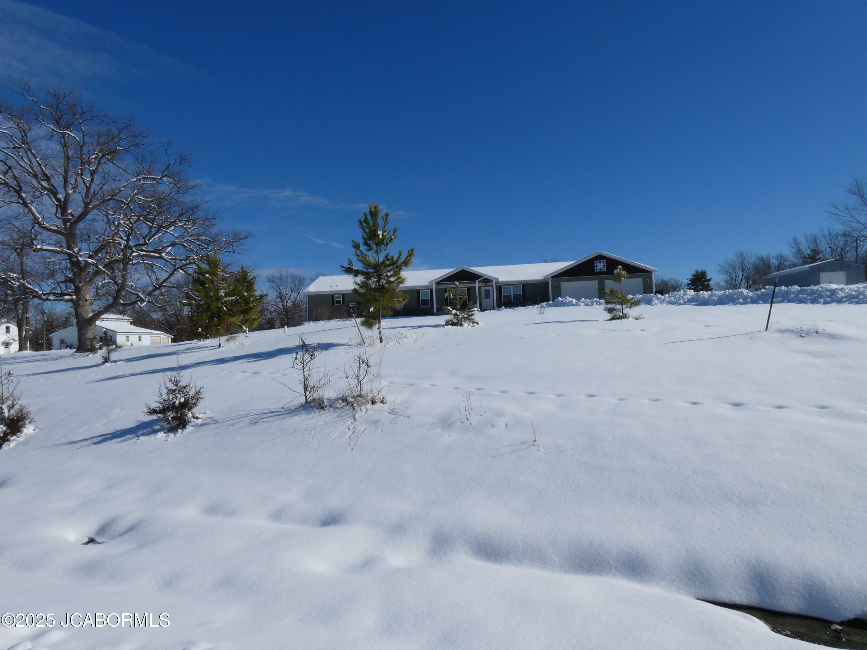 Property Photo:  1408 Rice Road  MO 65251 