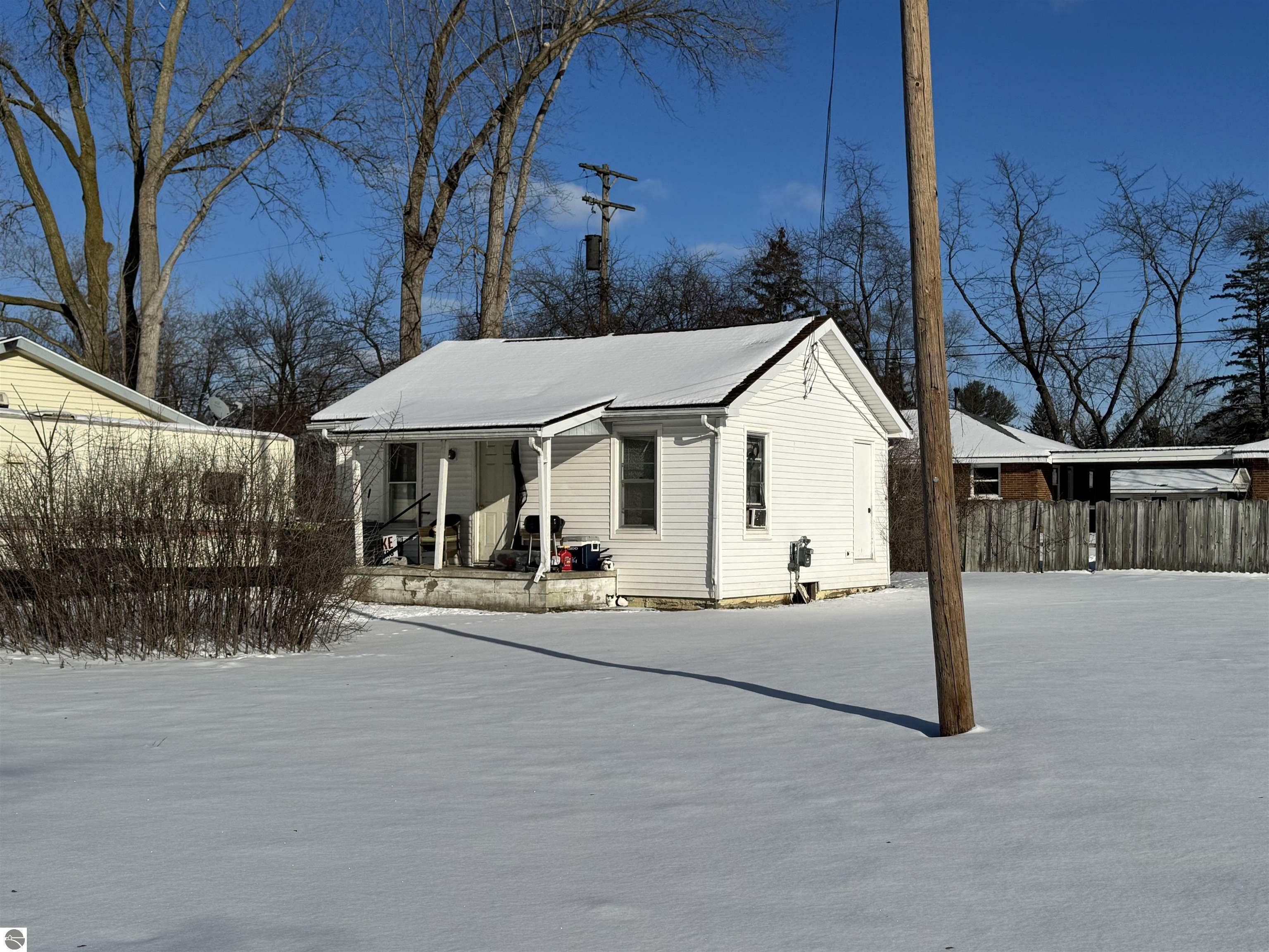 Property Photo:  410/412/414/416 Sam Street  MI 48642 