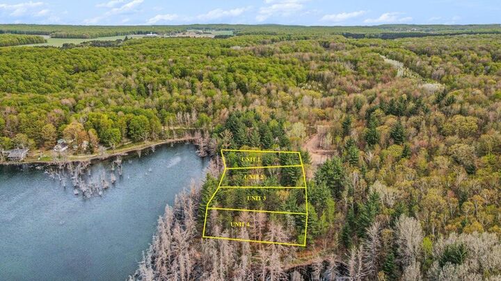 Property Photo: Unit 2 Lakeview Drive MI 49735