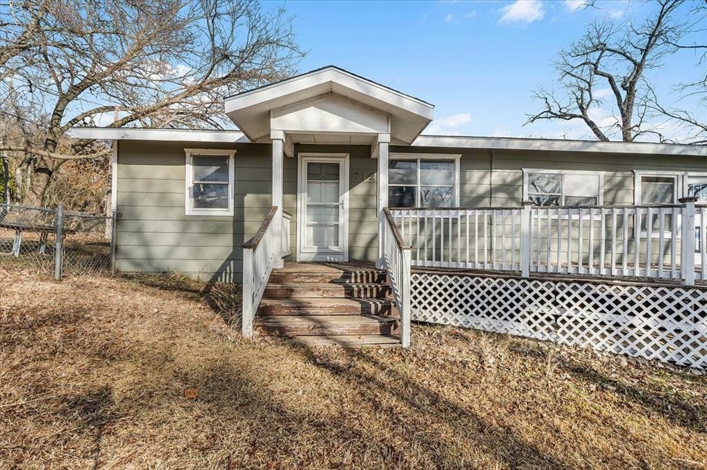 Property Photo:  712 W Lake Drive  TX 76087 