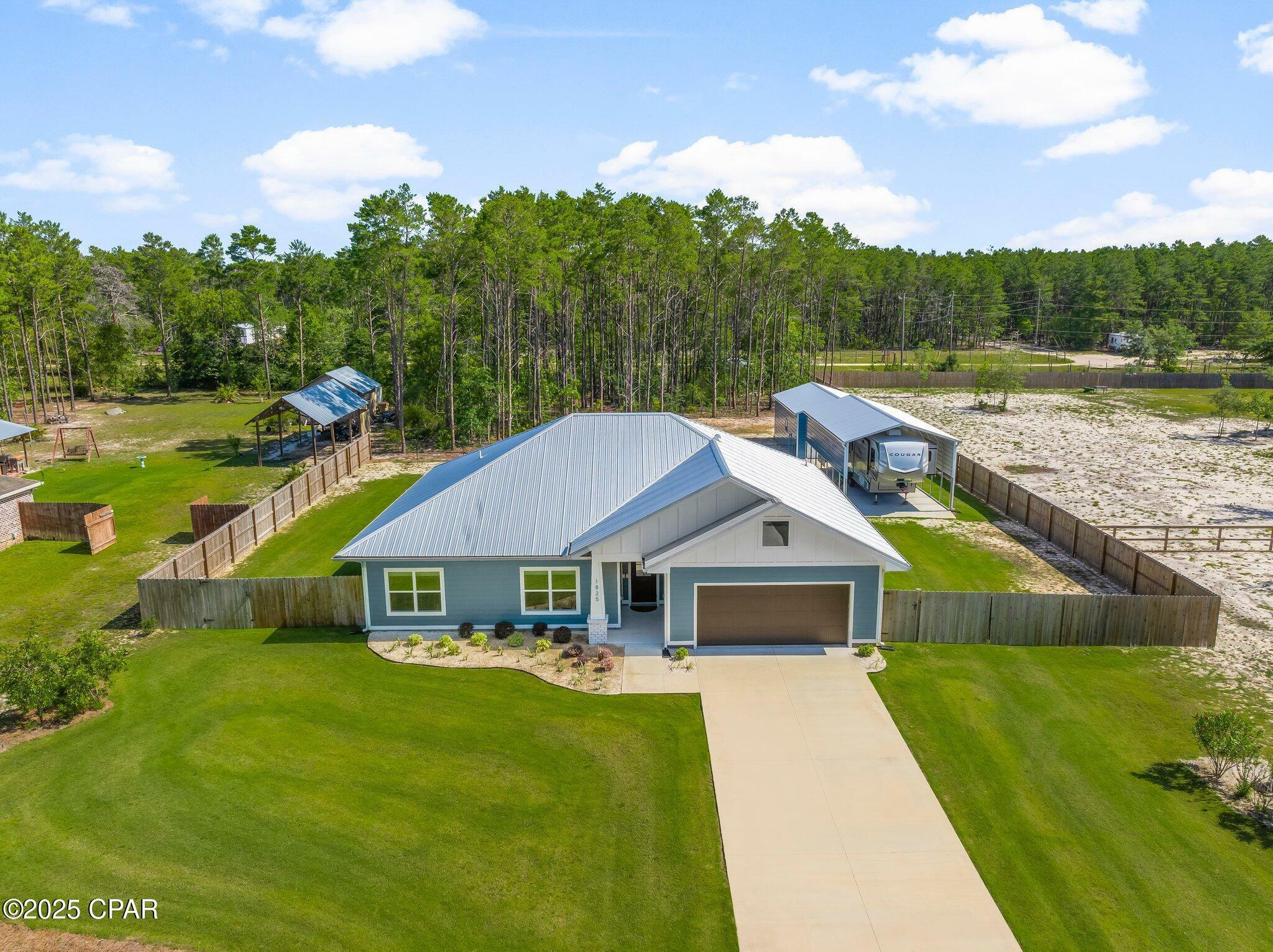 Property Photo: 1825 White Western Lake Lane FL 32409