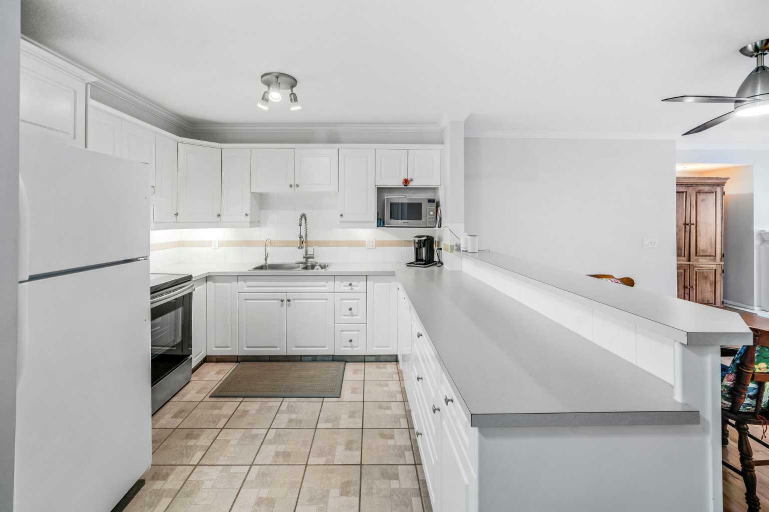 Property Photo:  705 56 Avenue SW 101  AB T2V 0G9 