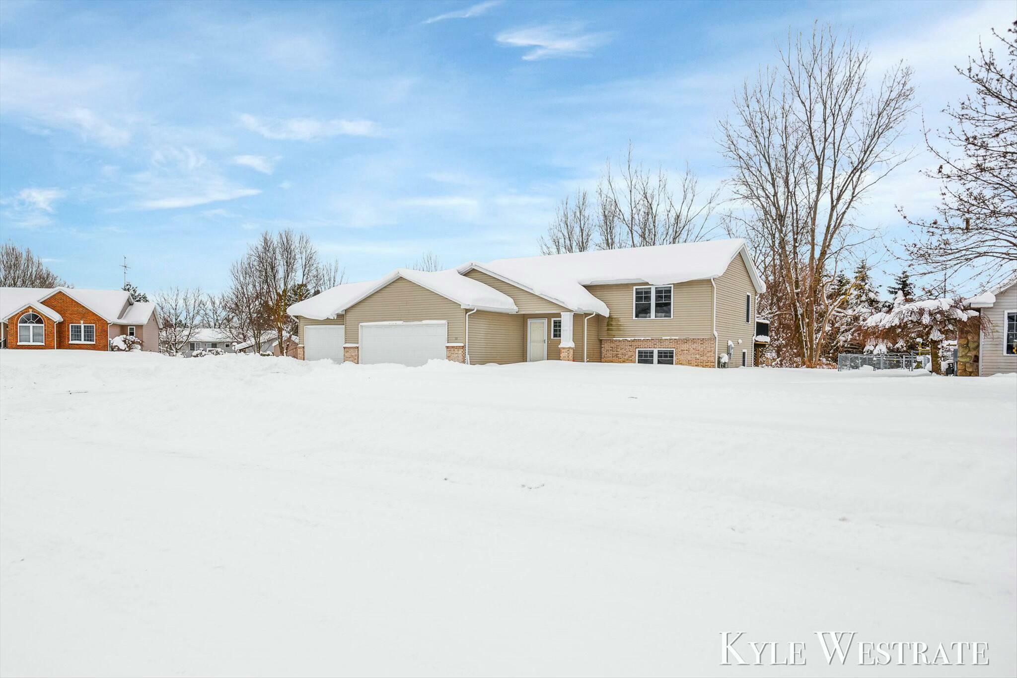 Property Photo:  80 Talon Drive  MI 49404 