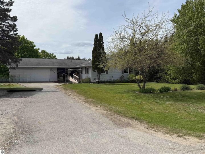Property Photo:  3935 E Long Lake Road  MI 49685 