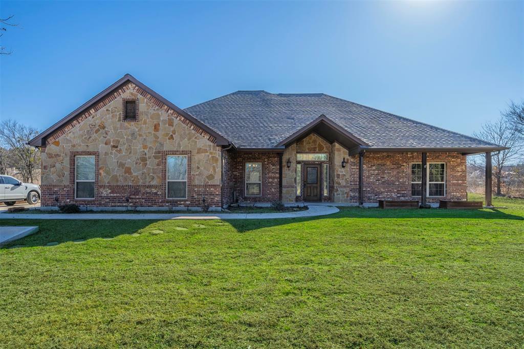 Property Photo:  208 Wrigley Drive  TX 76082 