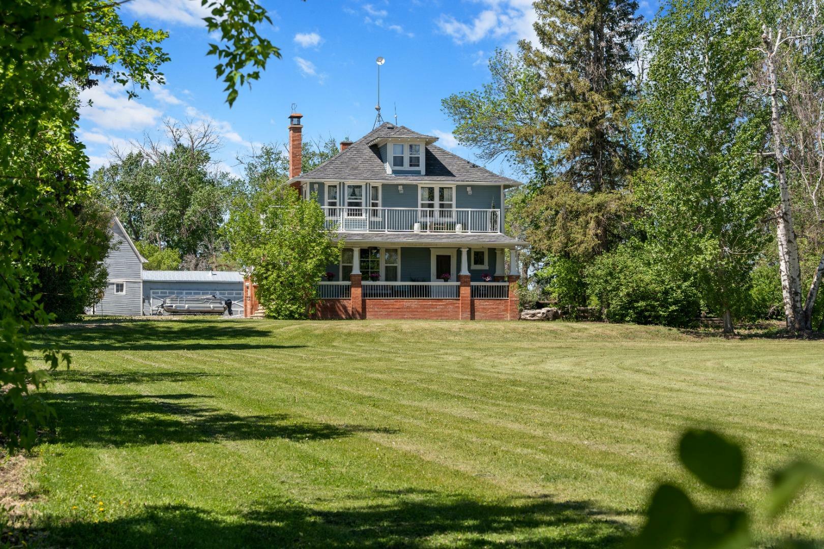 Property Photo: 230026 Range Road 255 AB T1P 1K9