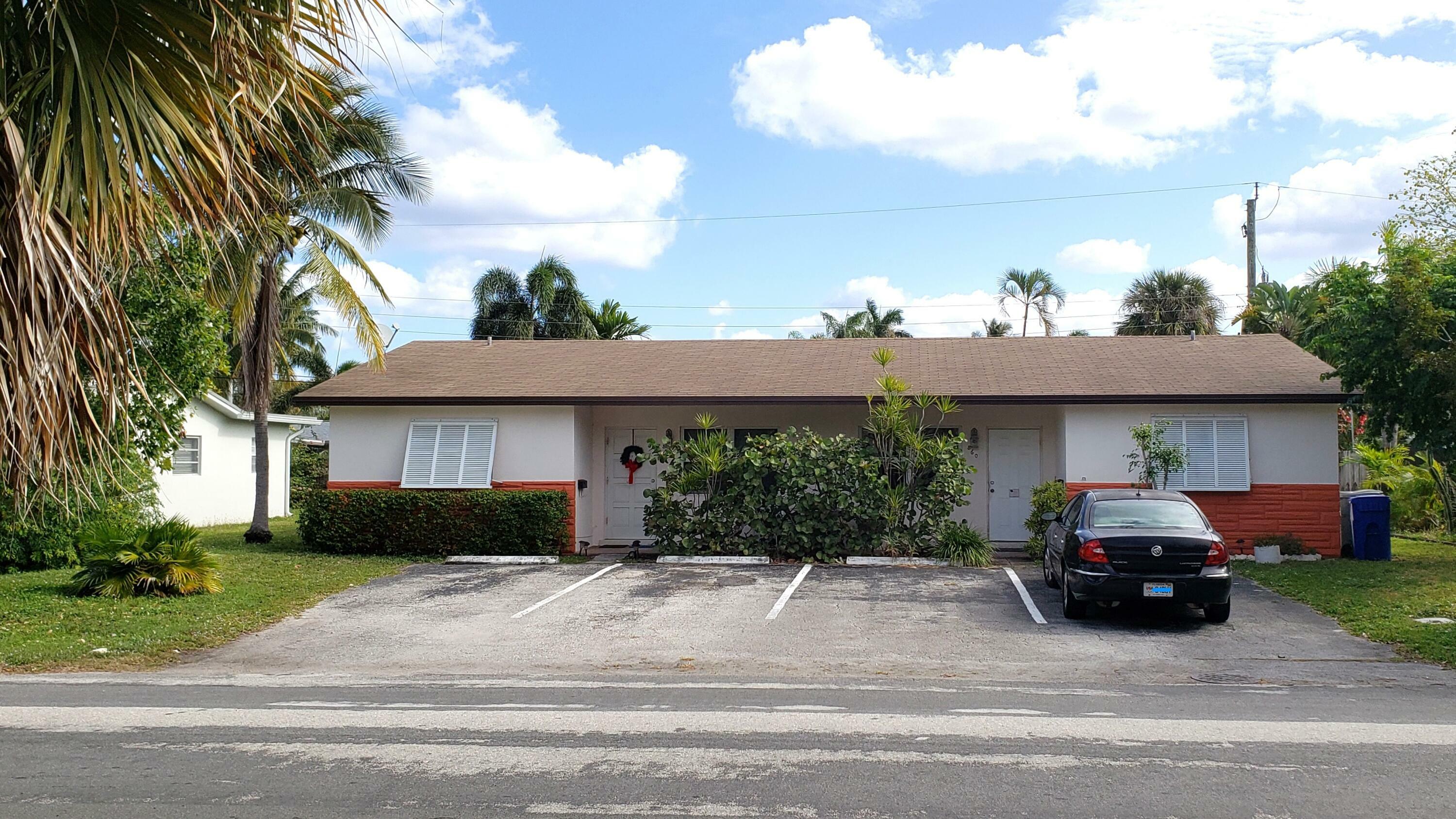 Property Photo:  860 NE 23rd Avenue 1-2  FL 33062 