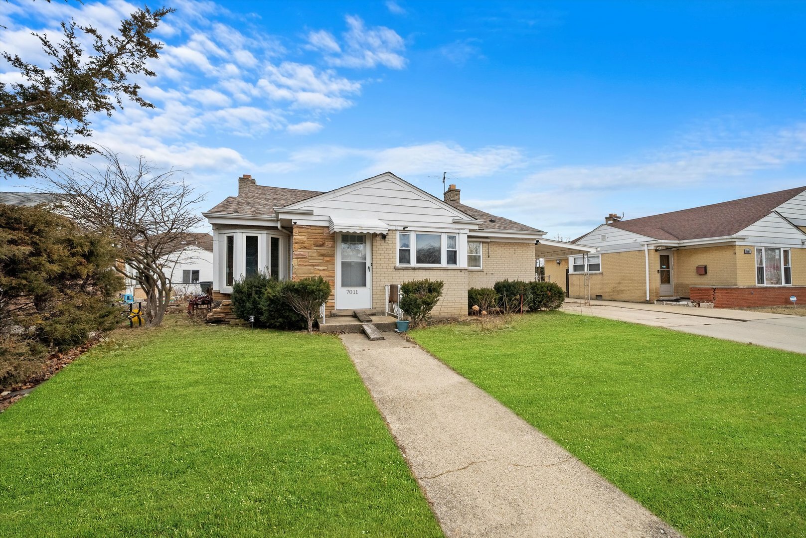 Property Photo:  7011 N Crawford Avenue  IL 60712 