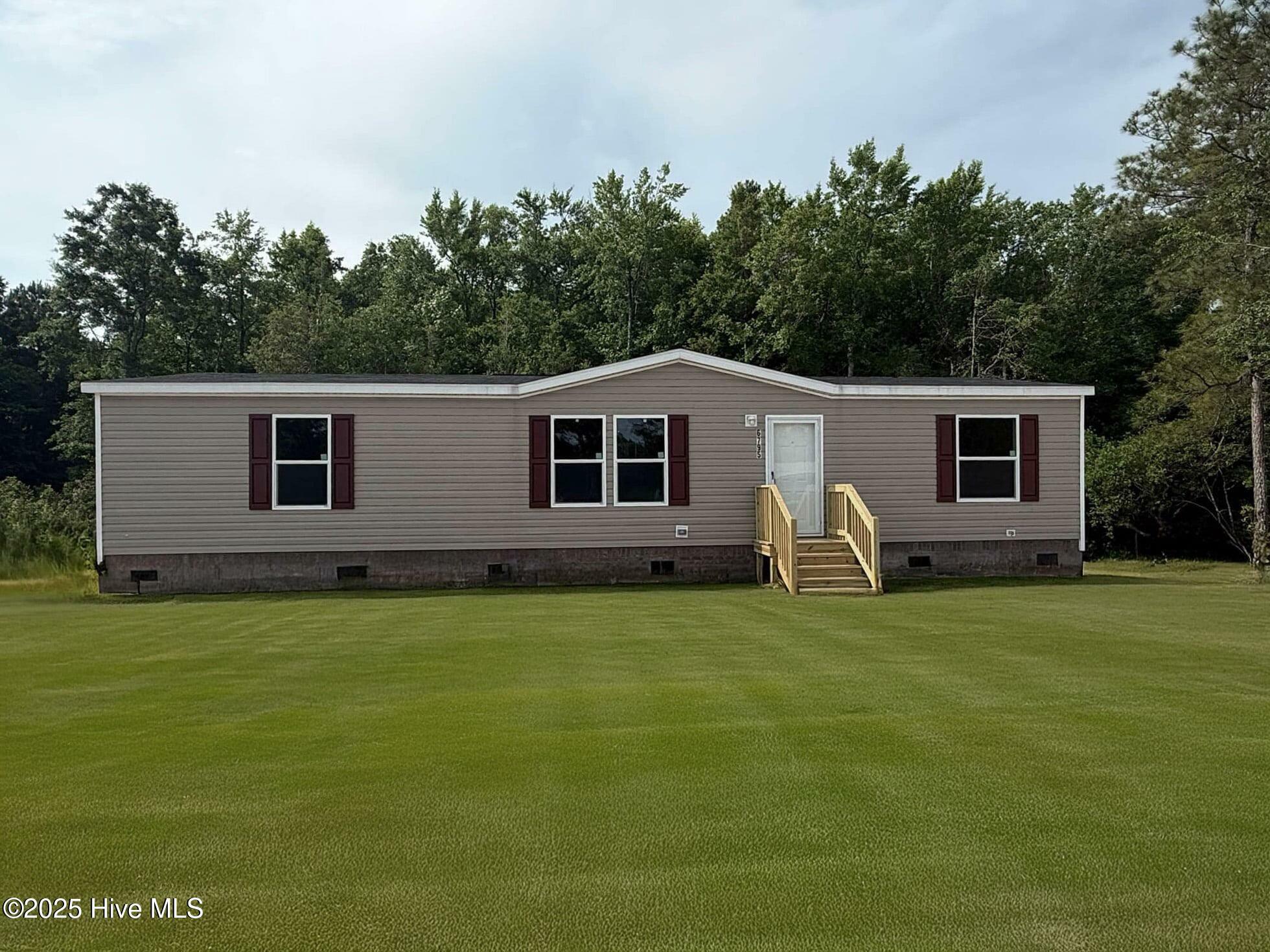 Property Photo: 6795 Lewis Drive SE NC 28479