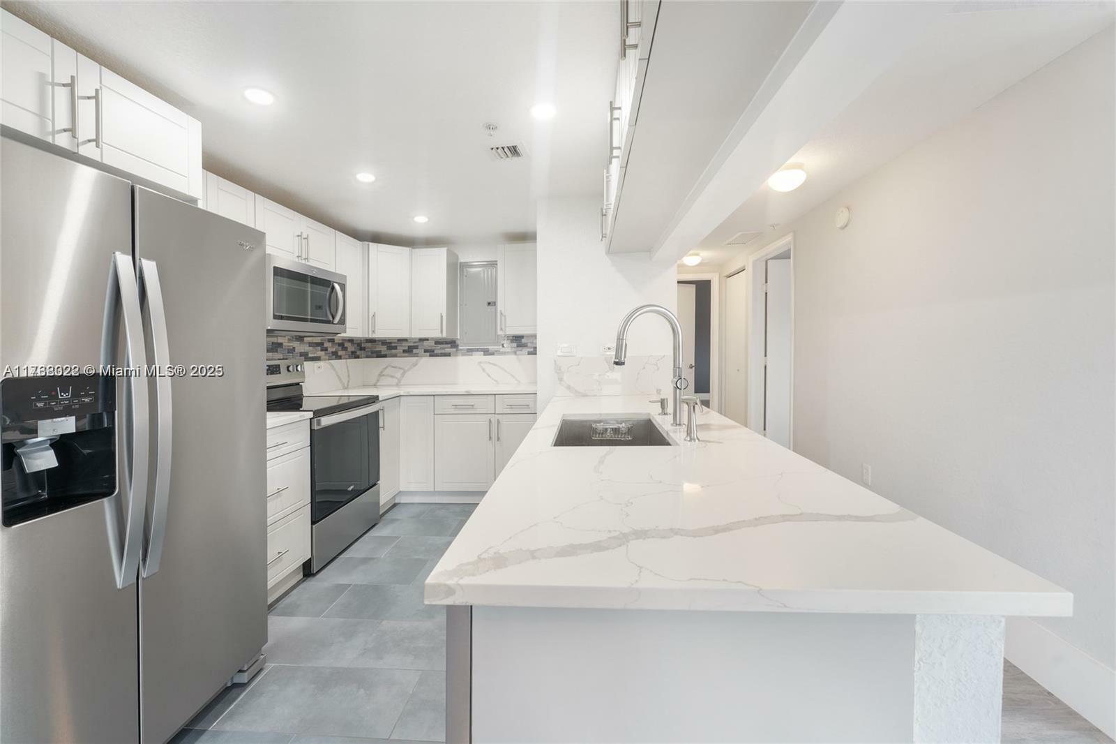 Property Photo:  36 NW 6th Ave 9  FL 33128 