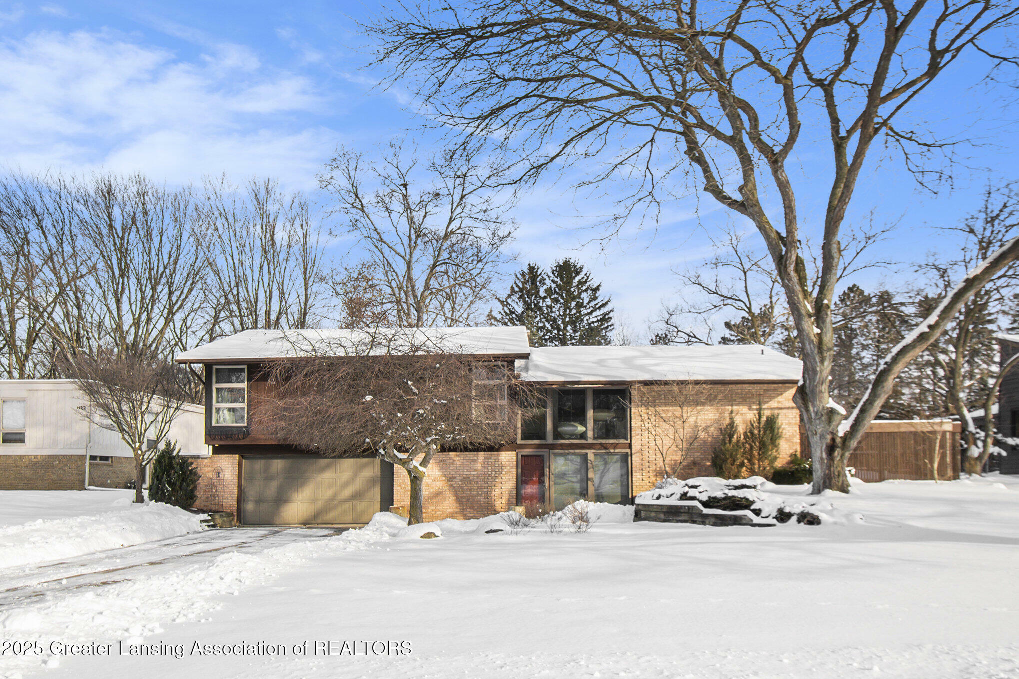 Property Photo:  1824 Mirabeau Drive  MI 48864 