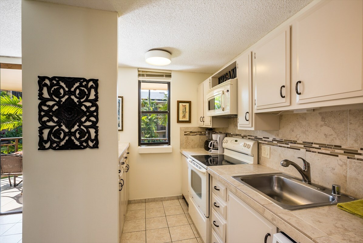 Property Photo:  75-6026 Alii Dr 5207  HI 96740 