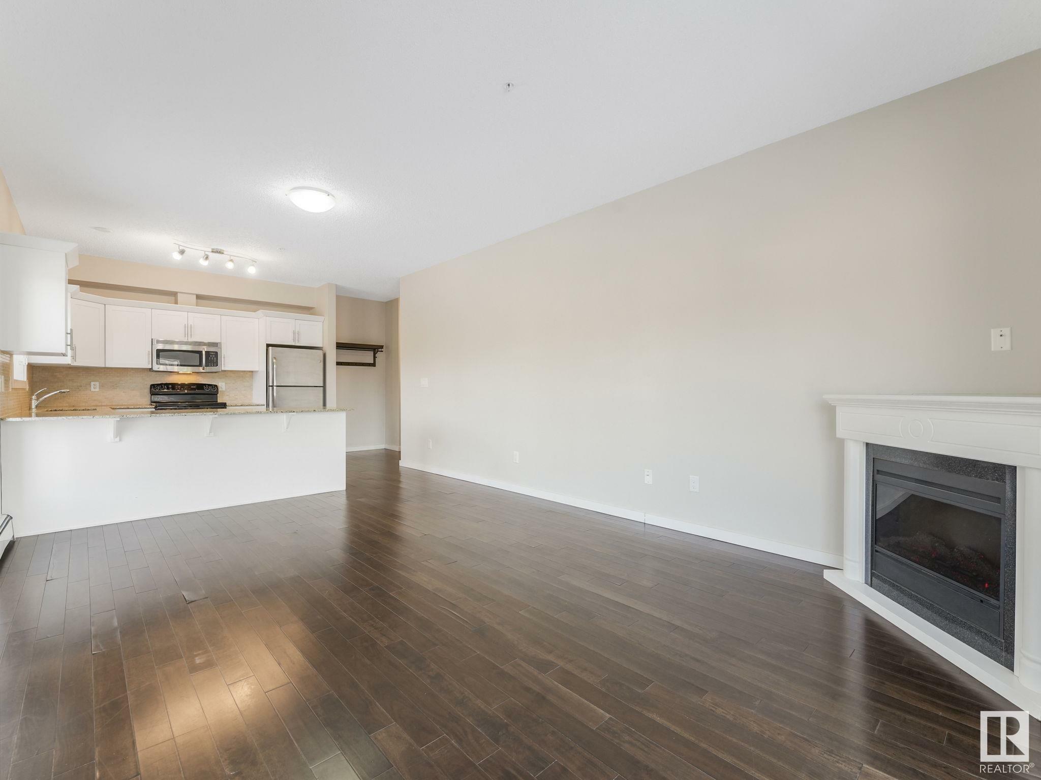 Property Photo:  10524 77 Avenue NW 304  AB T6E 1N1 