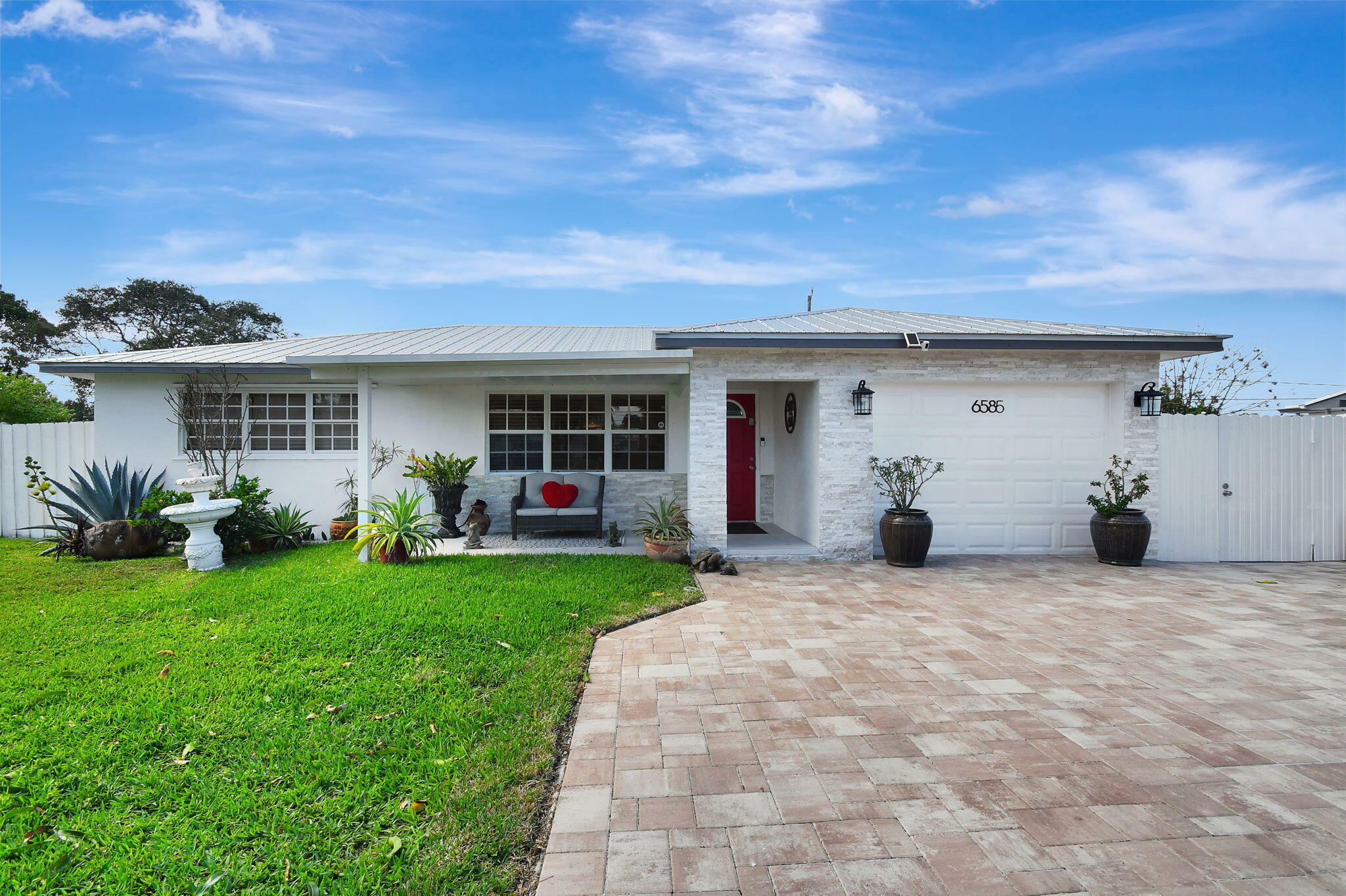 Property Photo:  6585 Osborne Drive  FL 33462 