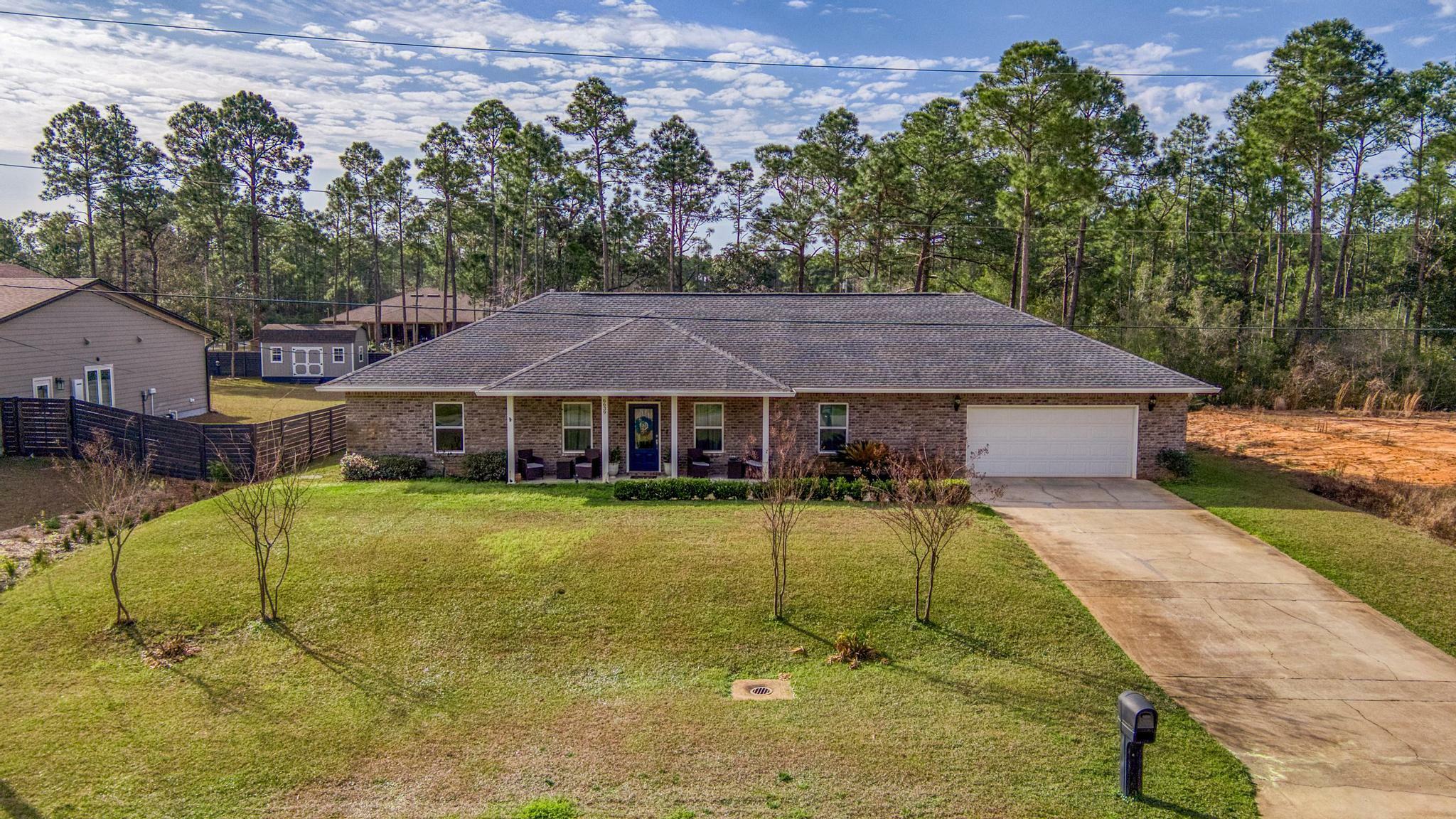 Property Photo:  6639 Angle Road  FL 32566 