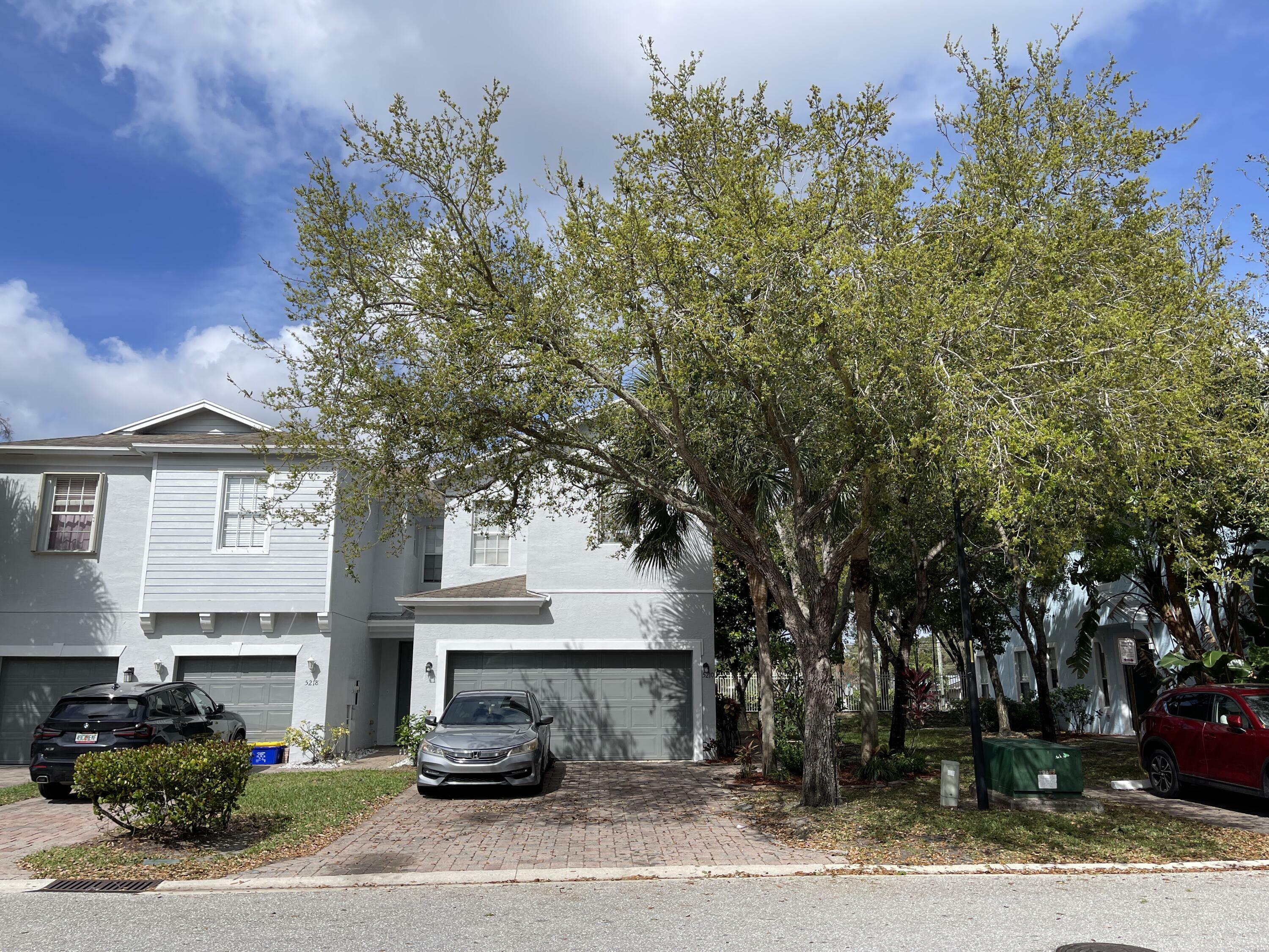 Property Photo: 5210 White Oleander FL 33415
