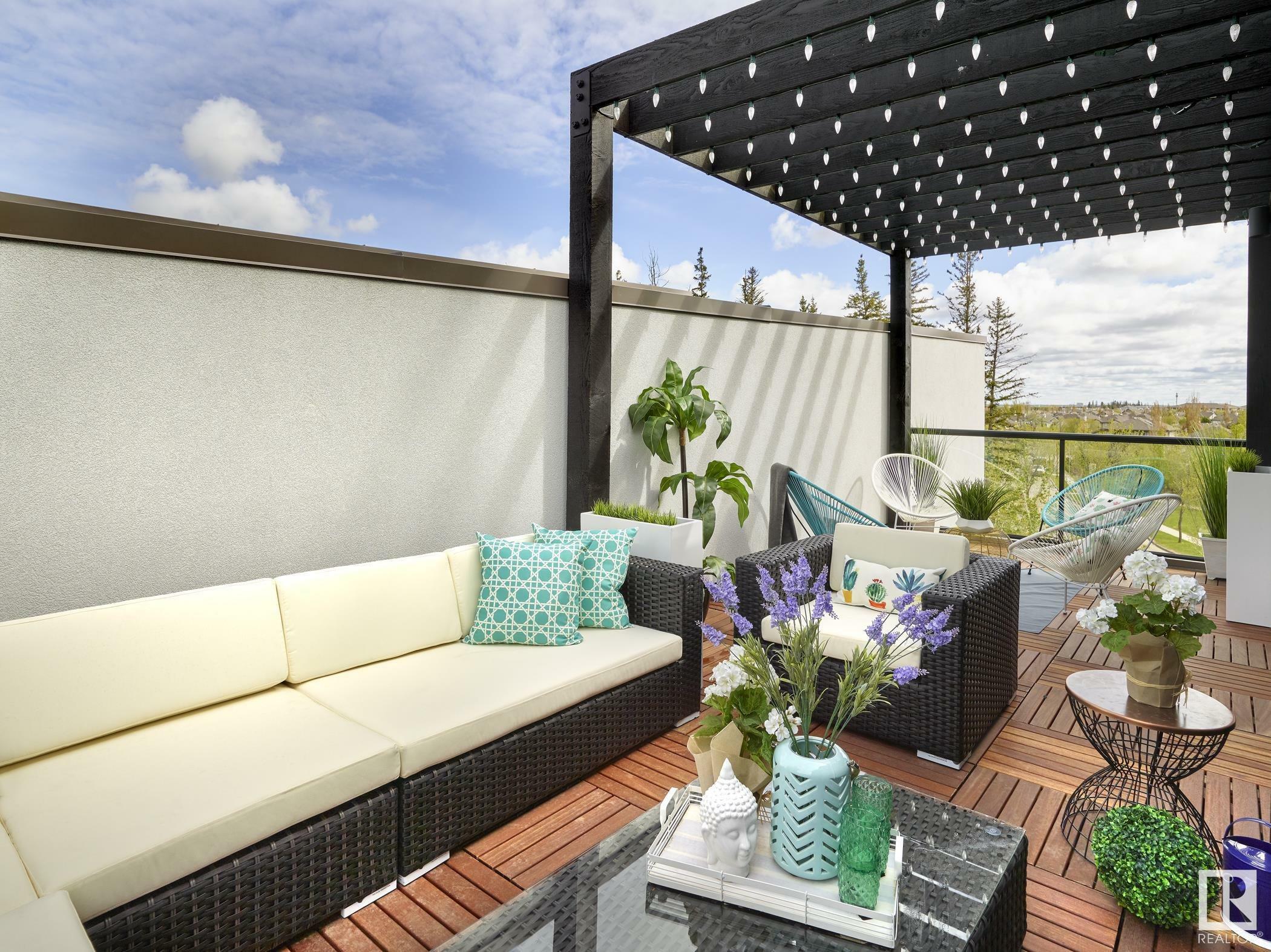 Property Photo: 1304 Rutherford Road SW 2 AB T6W 3W3