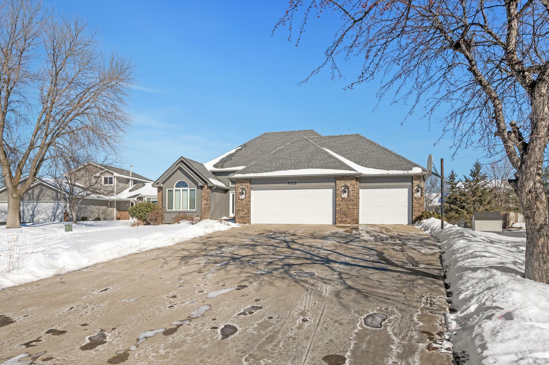 Property Photo:  9212 Queens Gardens N  MN 55443 