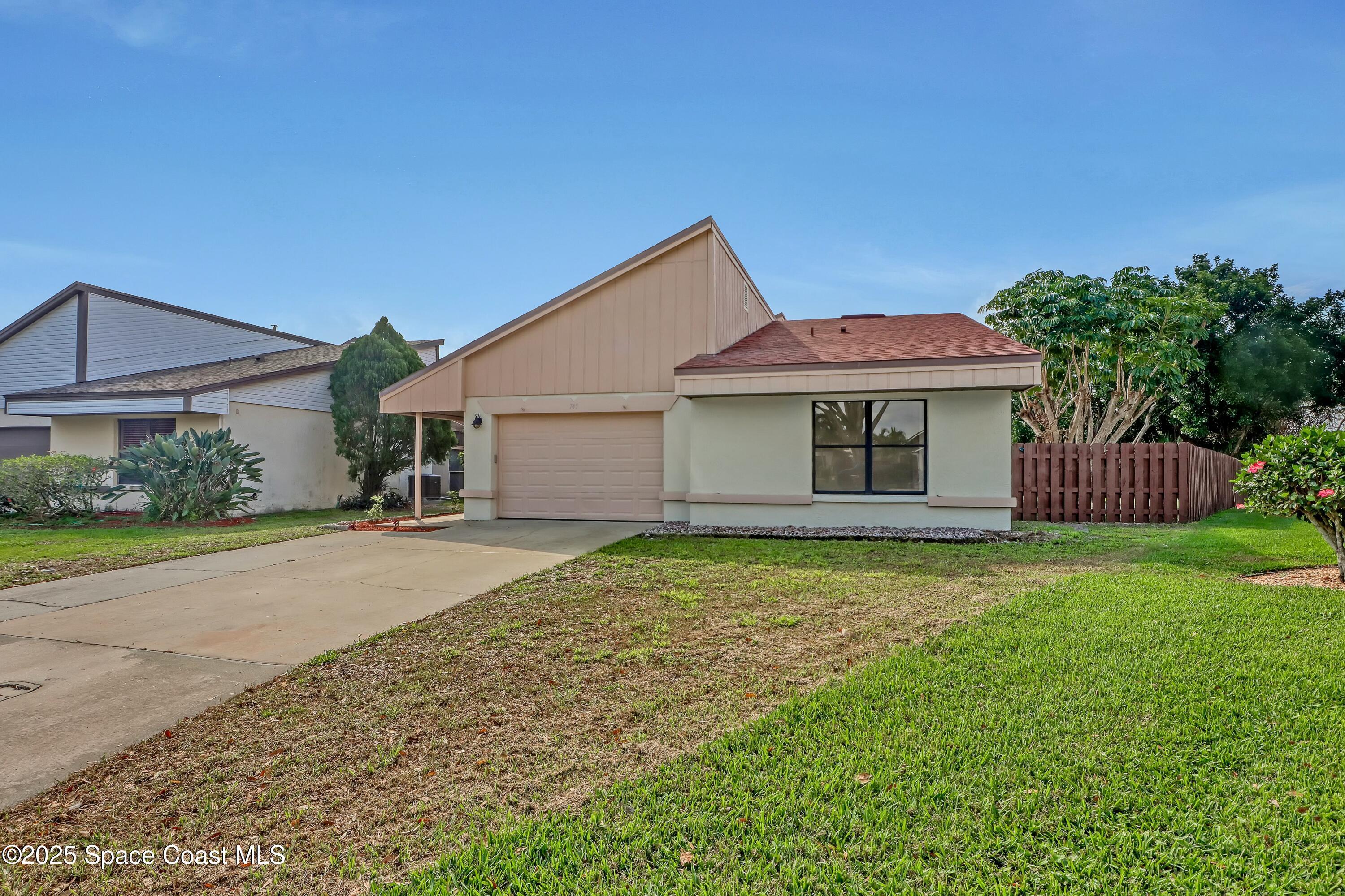 Property Photo: 745 Myrtlewood Lane FL 32940