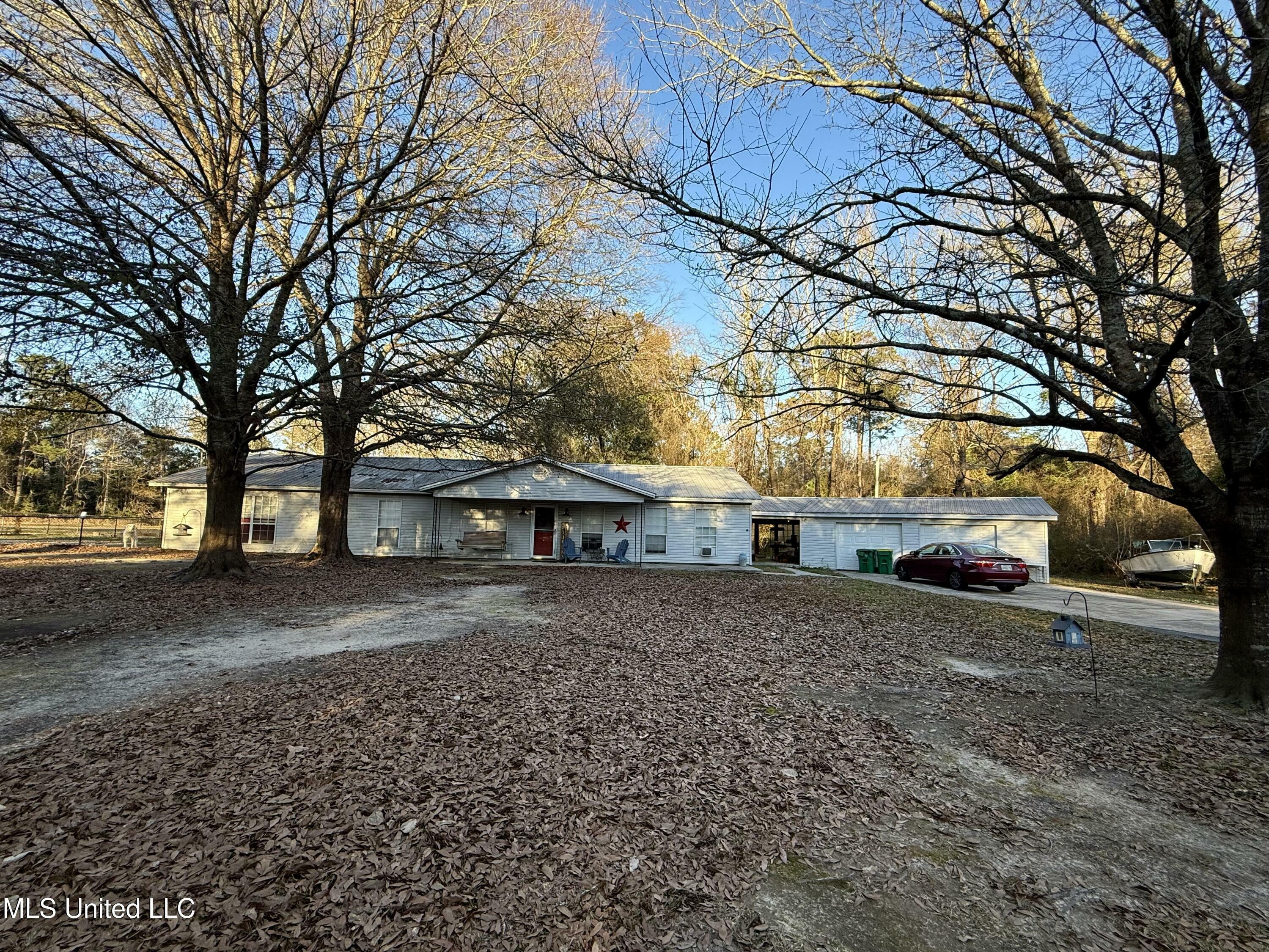 Property Photo:  15304 Old River Road  MS 39565 