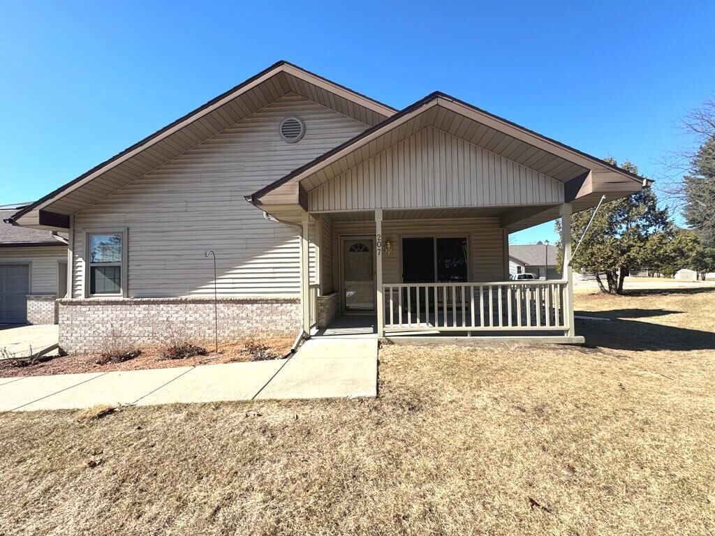 Property Photo: 207 Whitneys Way 3C WI 53534
