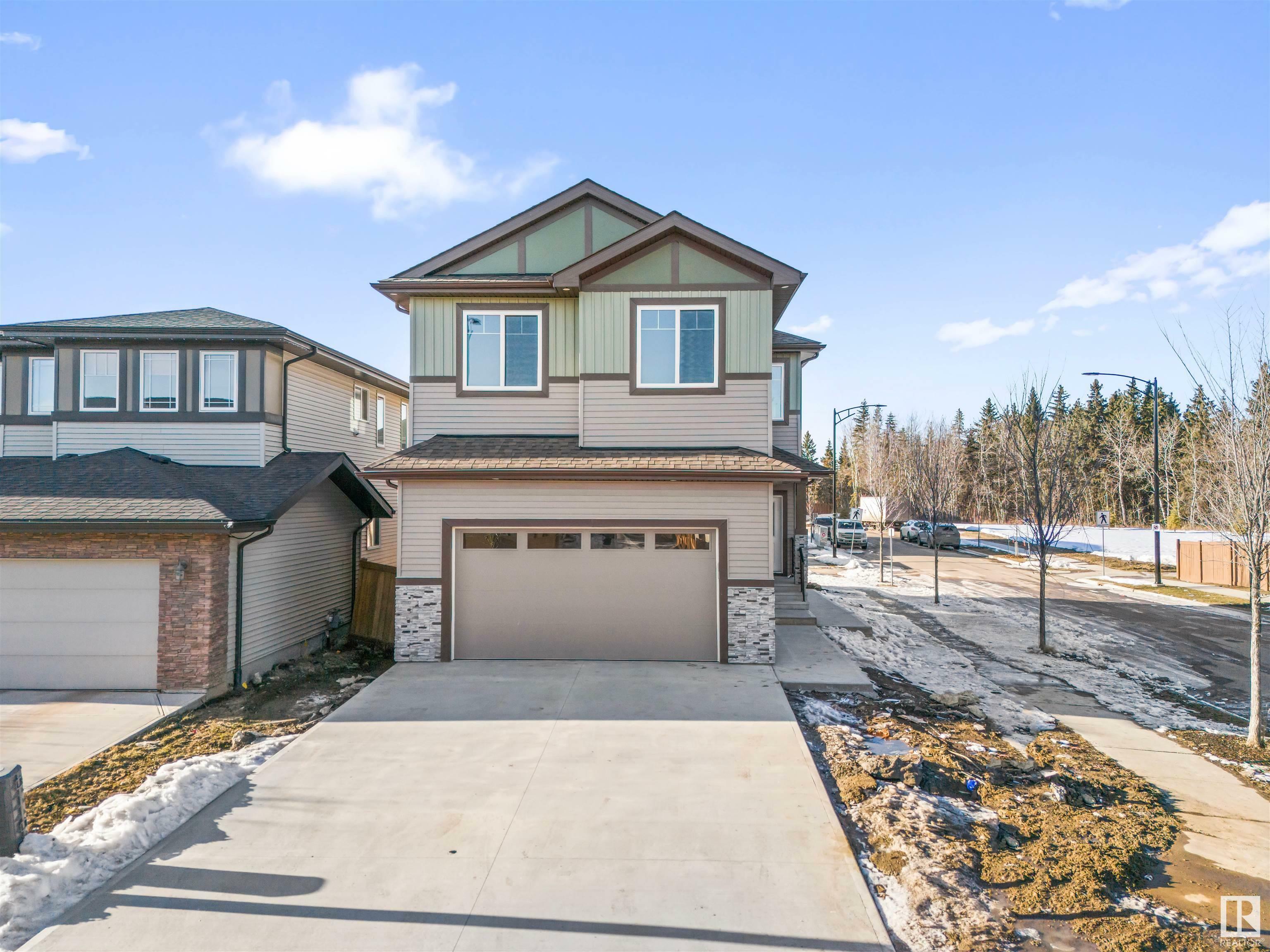 Property Photo: 204 Cavanagh Common SW AB T6W 4H4
