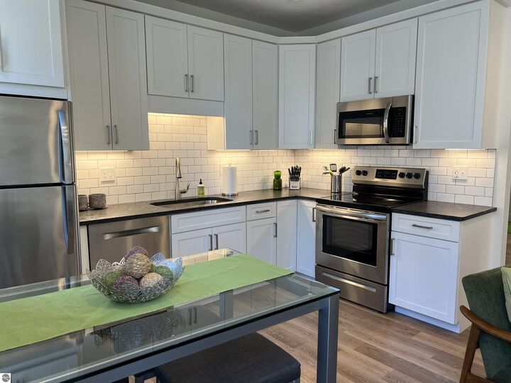 Property Photo: 135 E Eighth Street 211 MI 49684