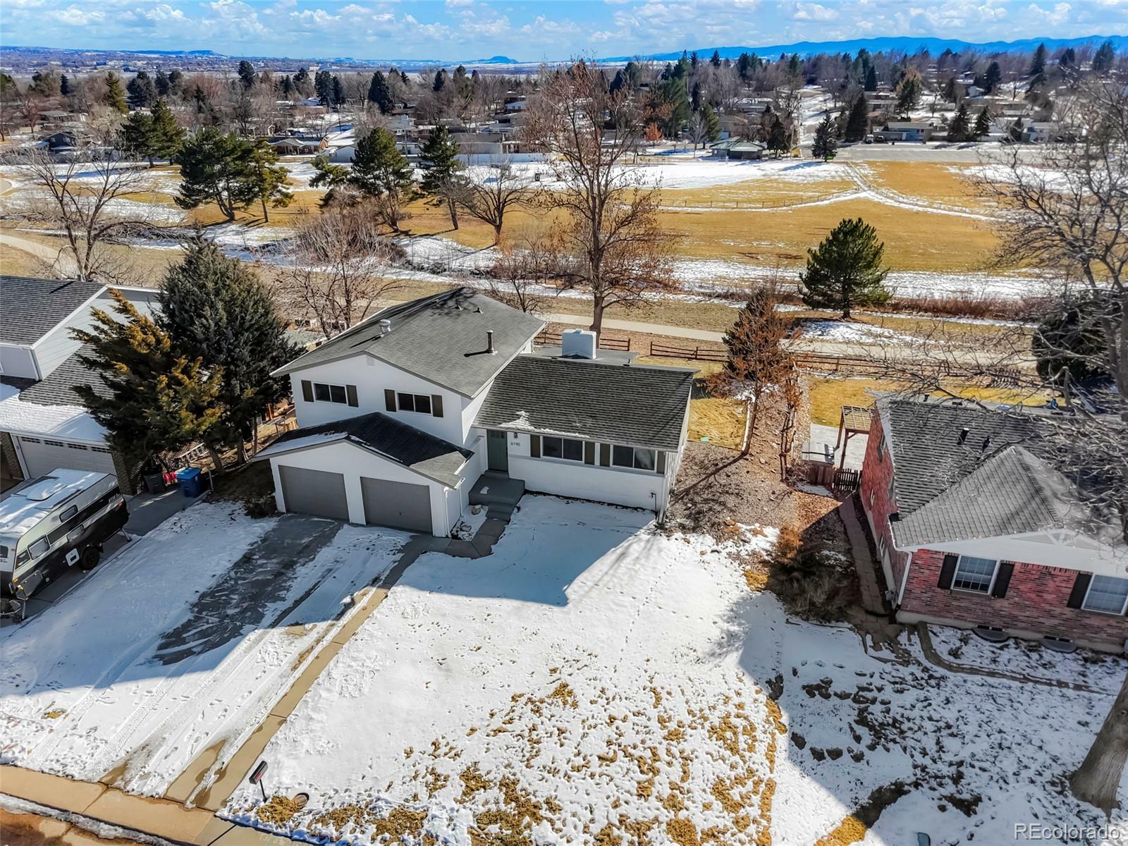 Property Photo: 6190 W Canyon Avenue CO 80128