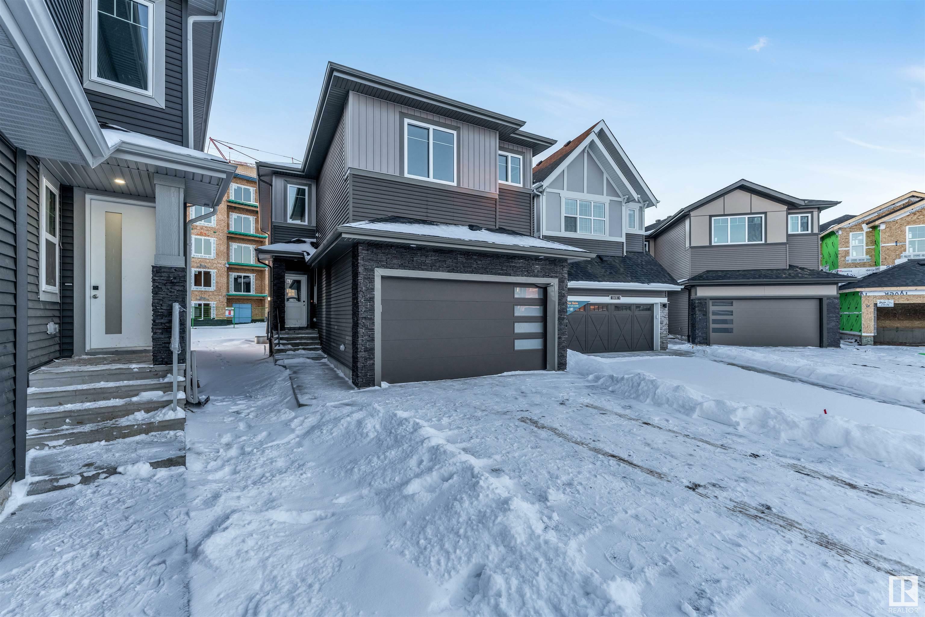 Property Photo:  8414 228A Street NW  AB T5T 4A3 