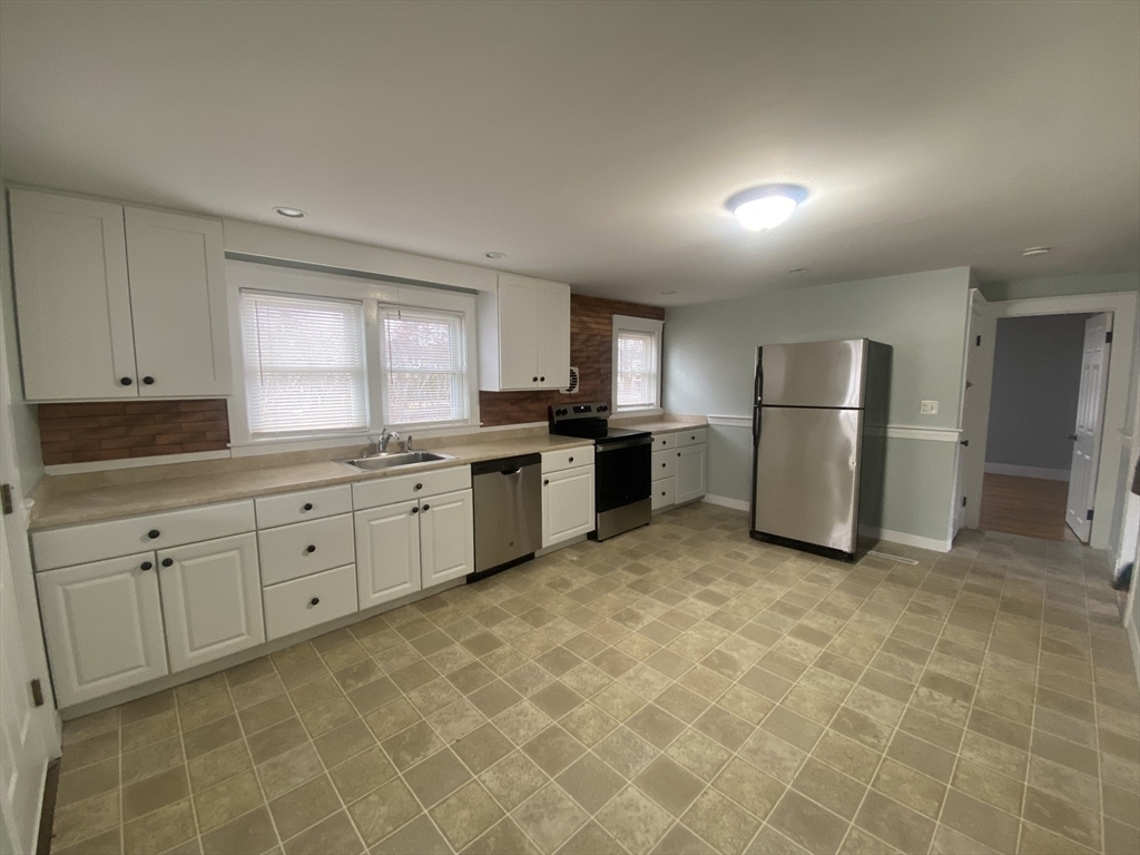 Property Photo:  459 Pond St. 1  MA 02190 