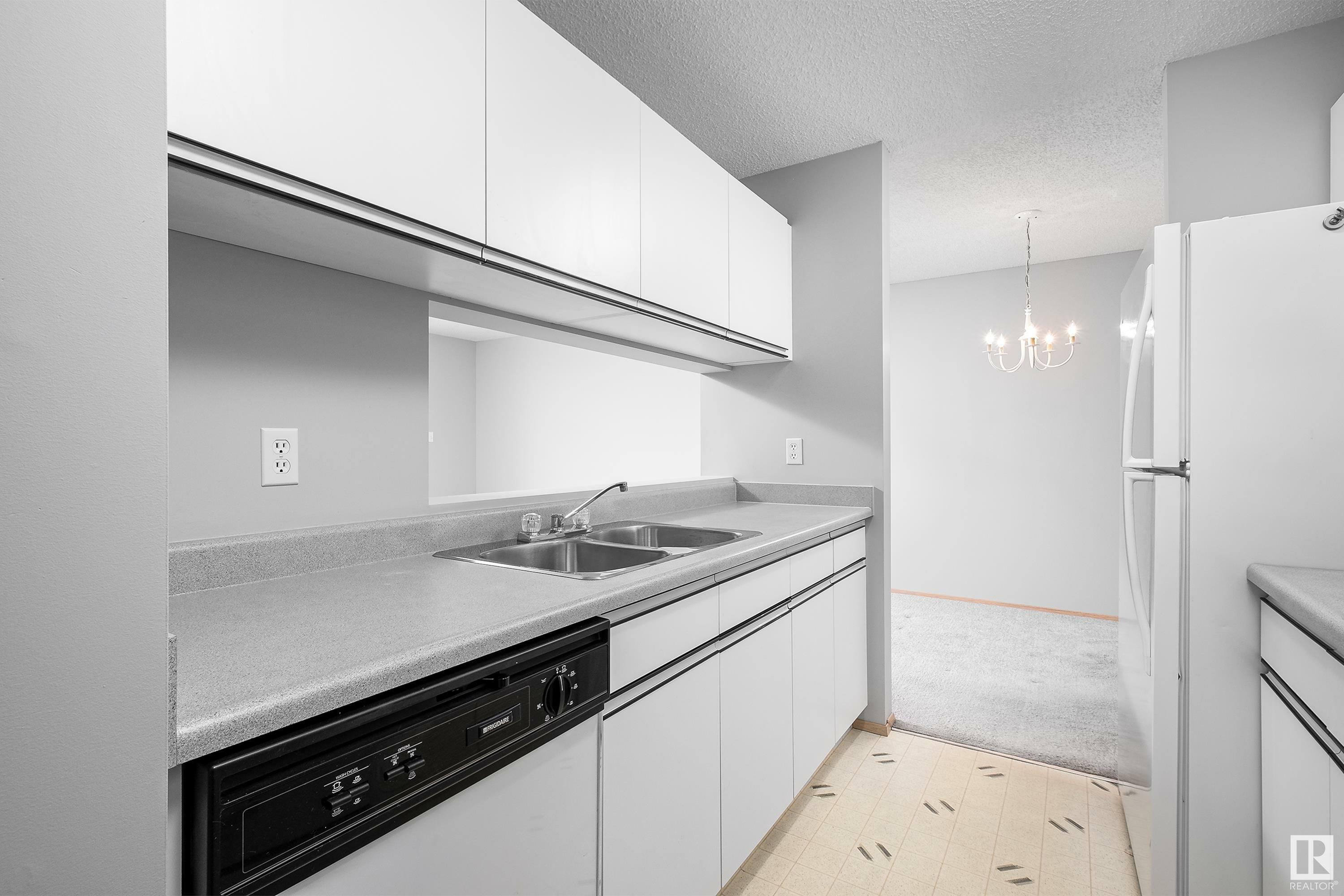 Property Photo: 2508 50 Street NW 320 AB T6L 6X9