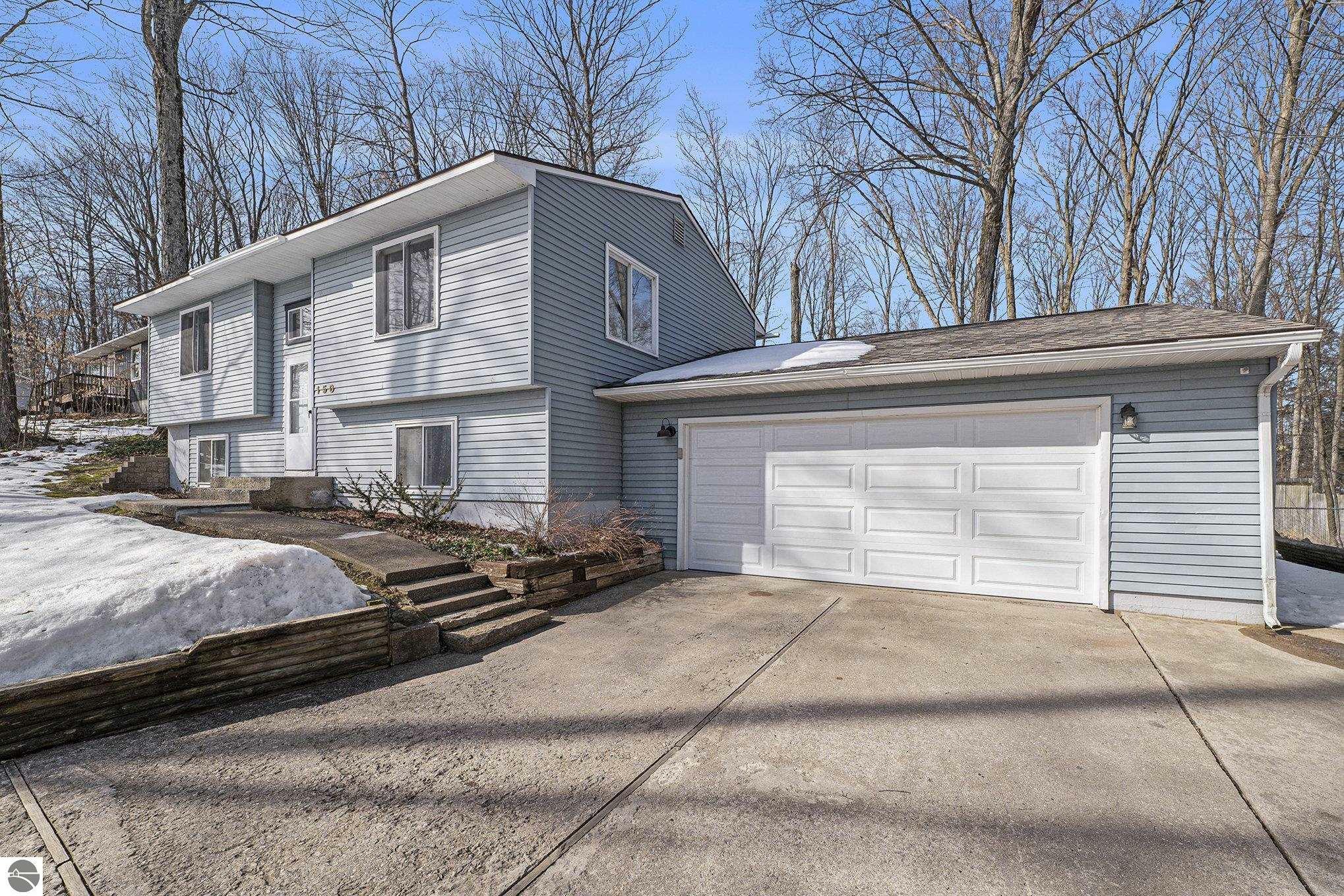 Property Photo:  150 S Four Mile Road  MI 49696 