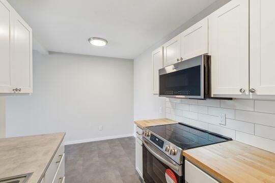 Property Photo:  2005 E 122nd Street A23  MN 55337 