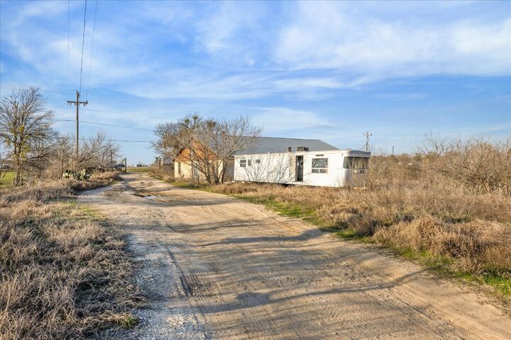 Property Photo:  4975 E Highway 71 Highway E  TX 78617 