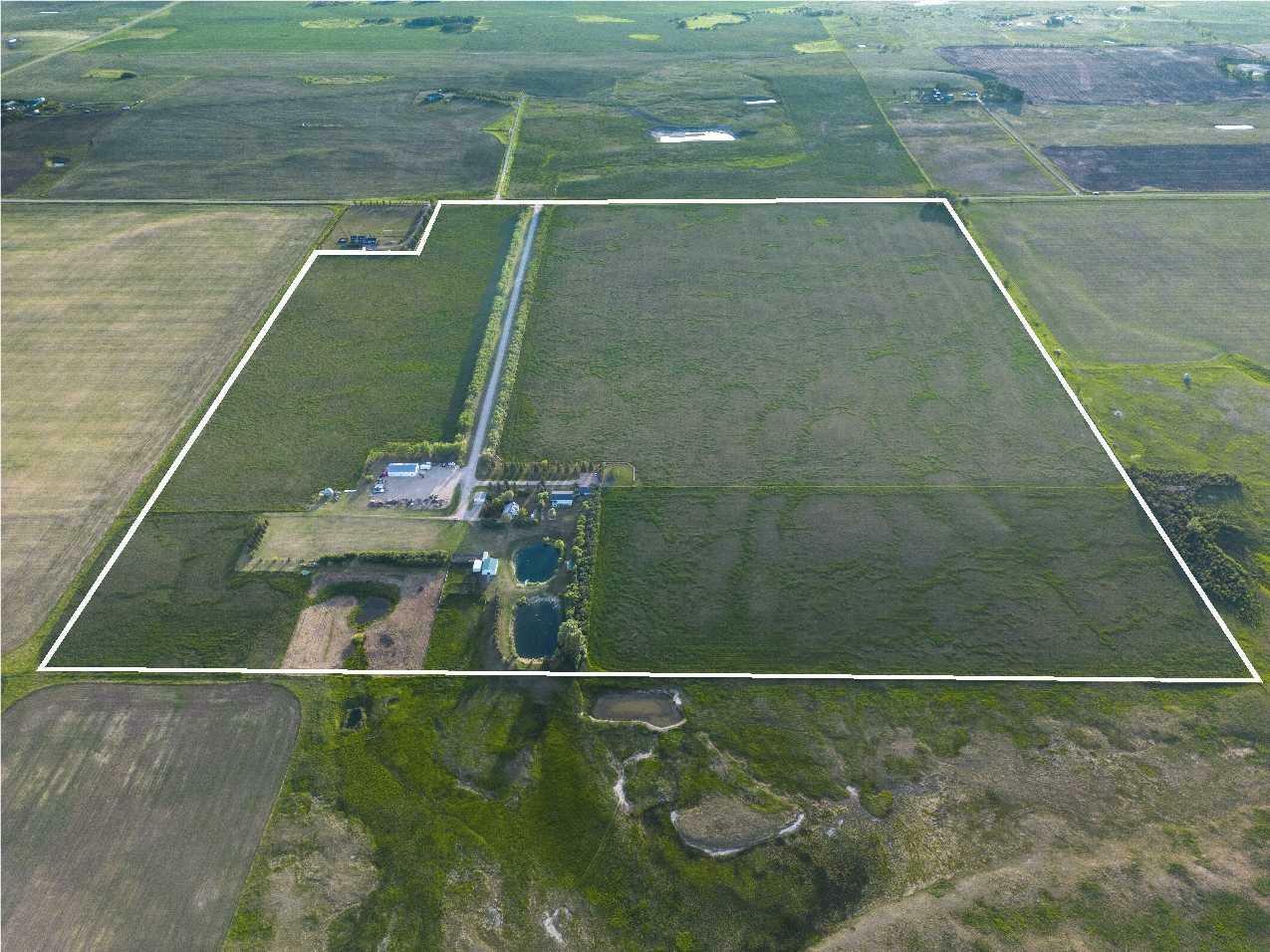 Property Photo: 270168 Range Road 283 AB T4A 2S9